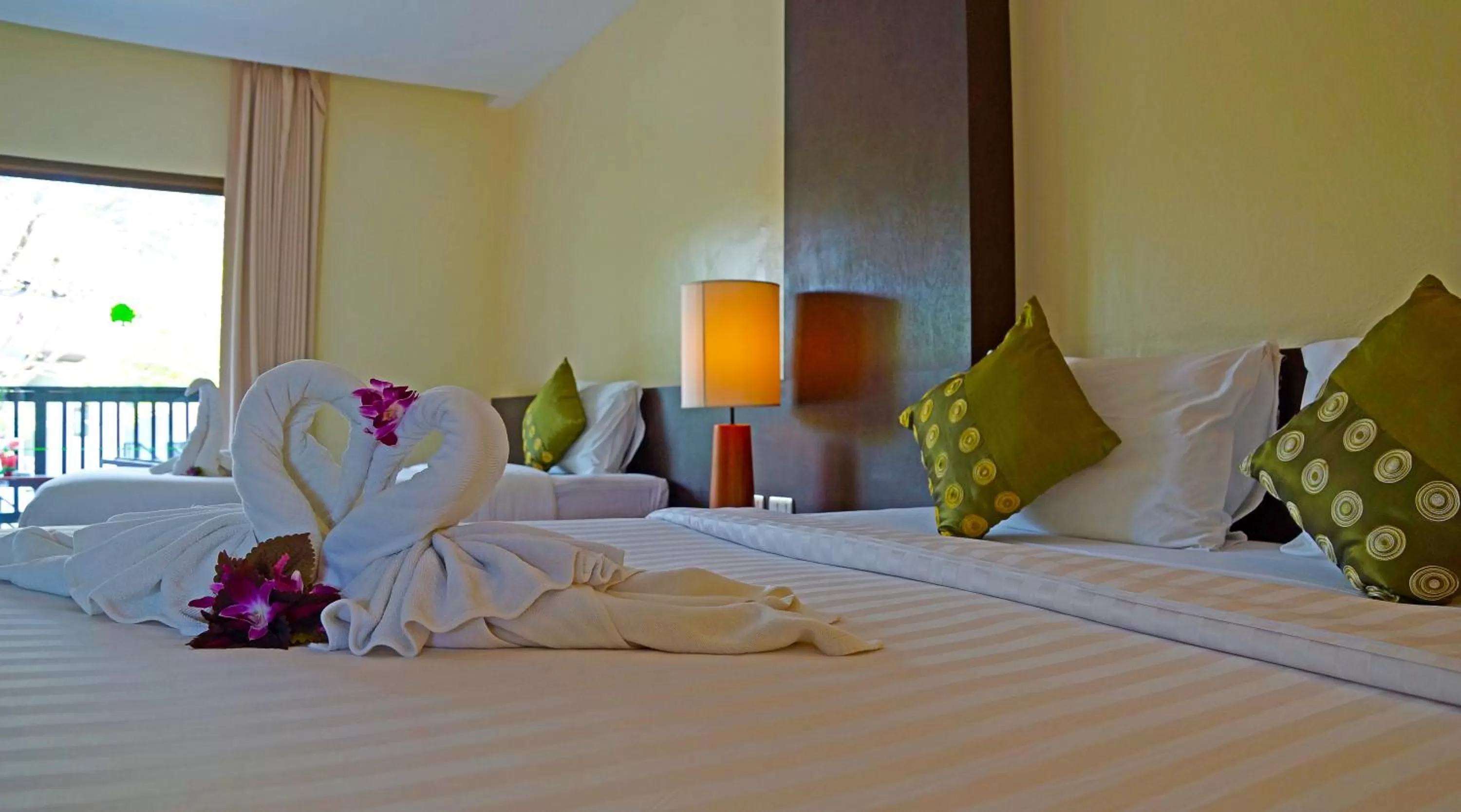 Bed in Palm Galleria Resort