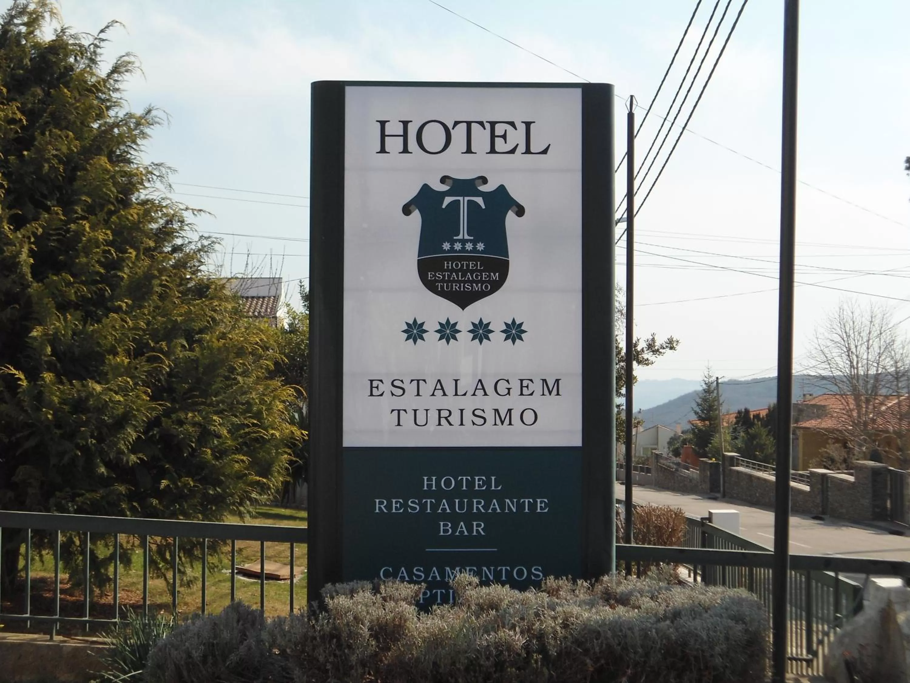 Property logo or sign in Hotel Estalagem Turismo