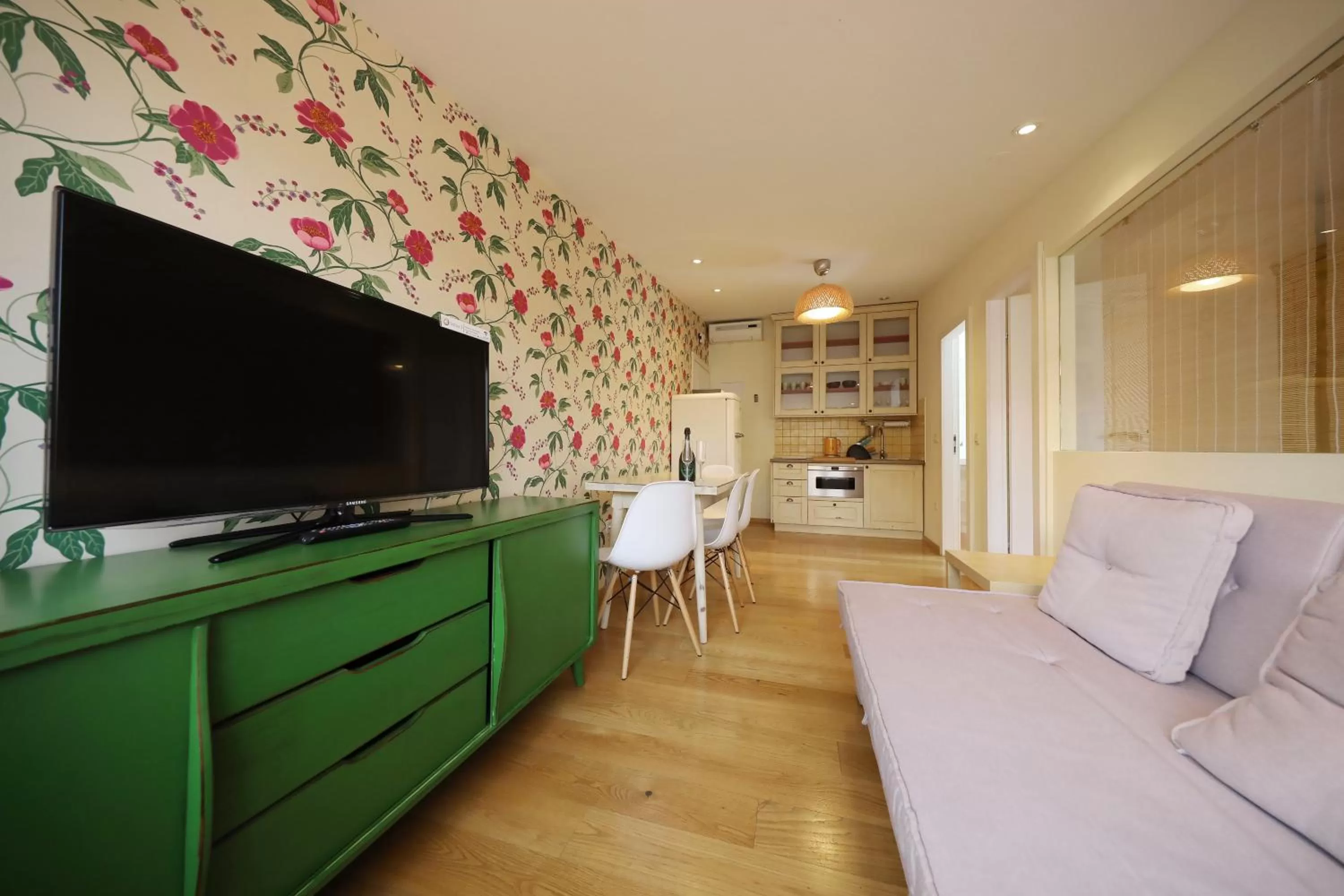 TV and multimedia in Central Apartments Integrated Hotel