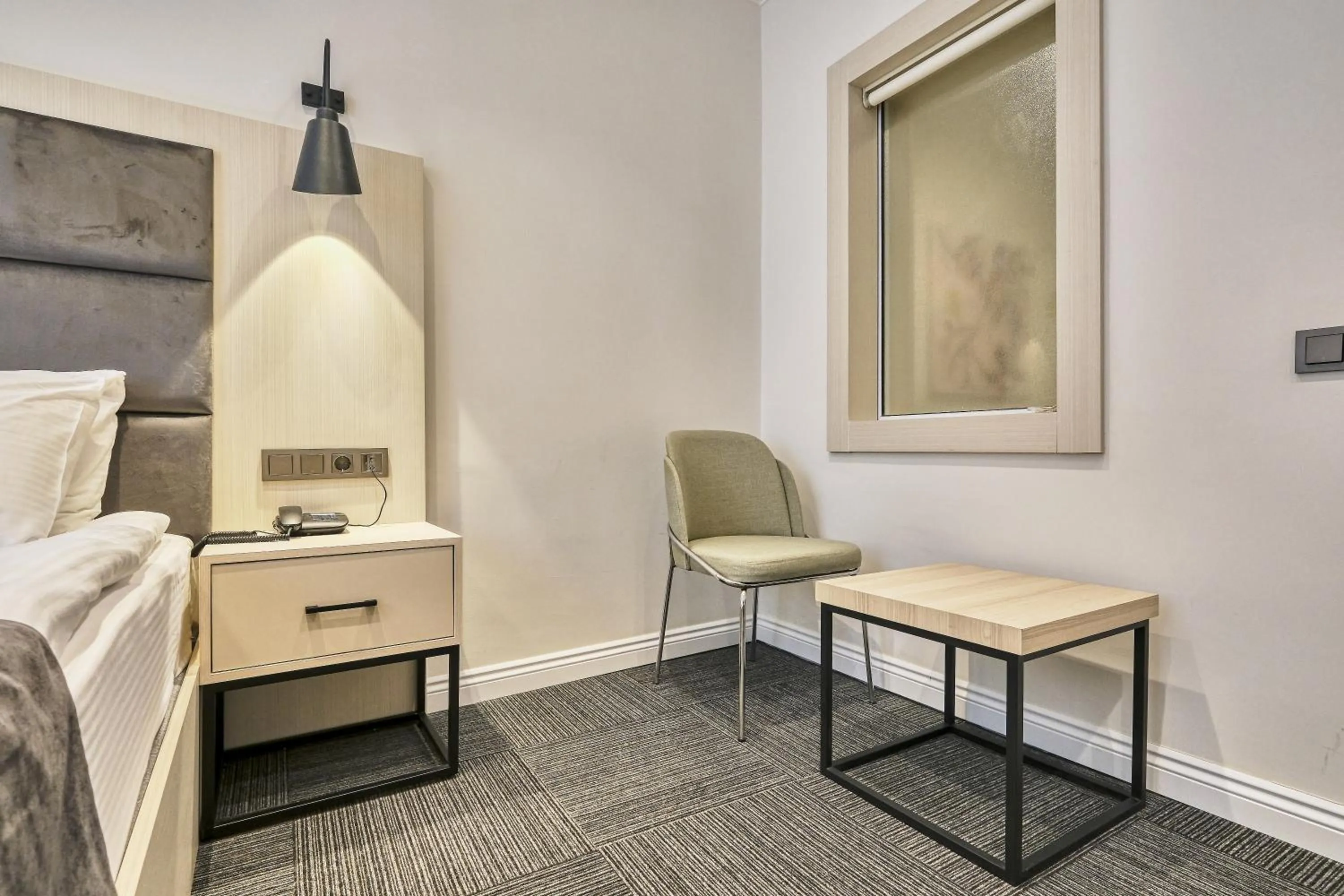 Living room, Bed in Hub Suite Istanbul