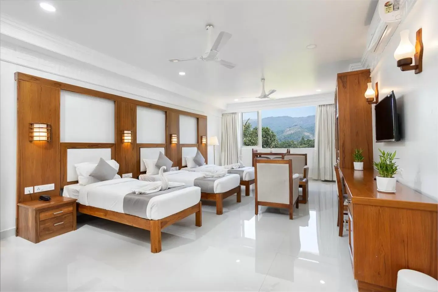Luxury Triple Room in HOTEL WHITE HOUSE, Munnar Luxury Triple Room in HOTEL WHITE HOUSE, Munnar