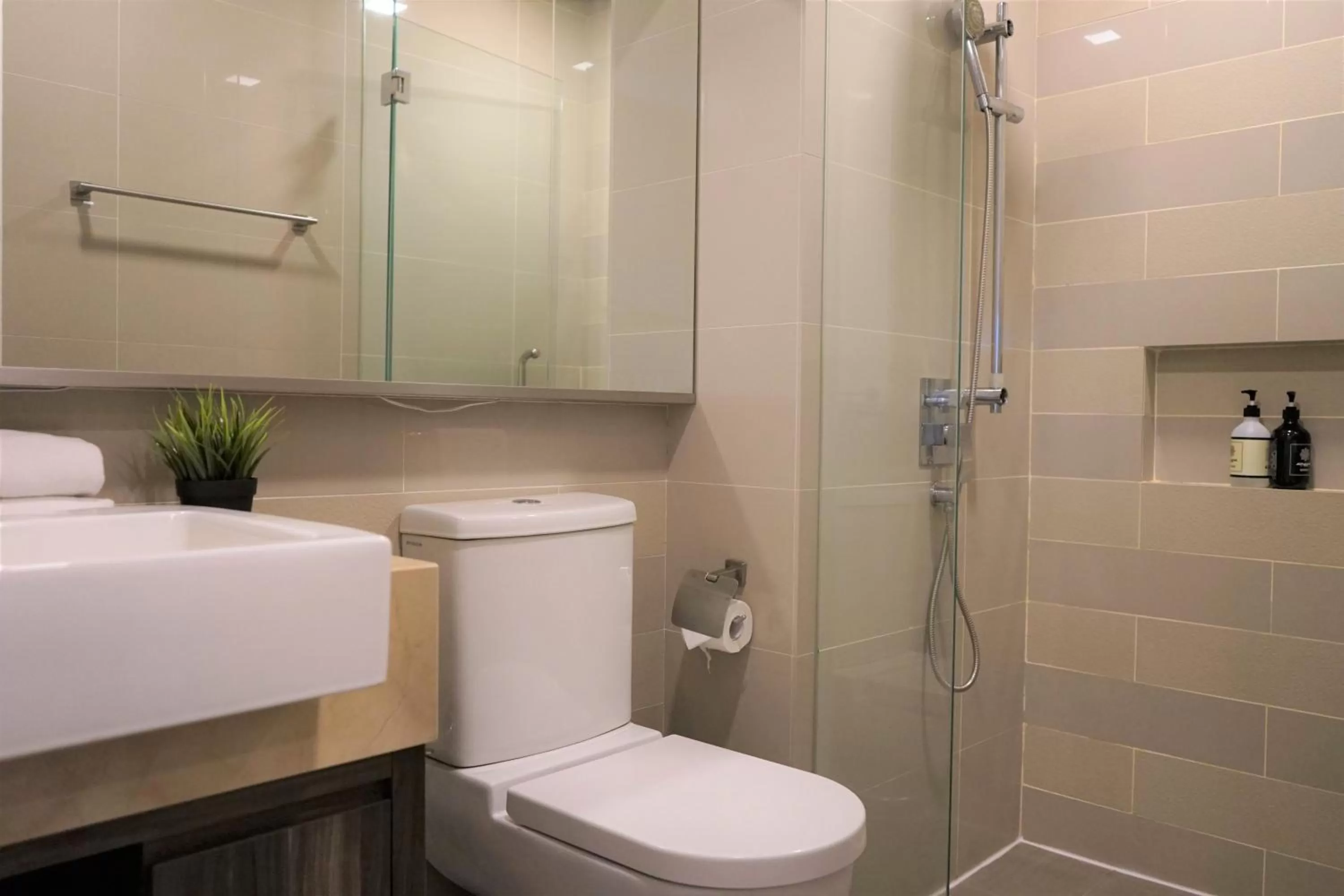 Bathroom in Ramada Suites by Wyndham Kuala Lumpur City Centre