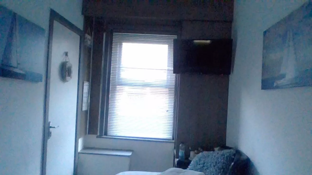 TV/Entertainment Center in Kings Boutique Hotel