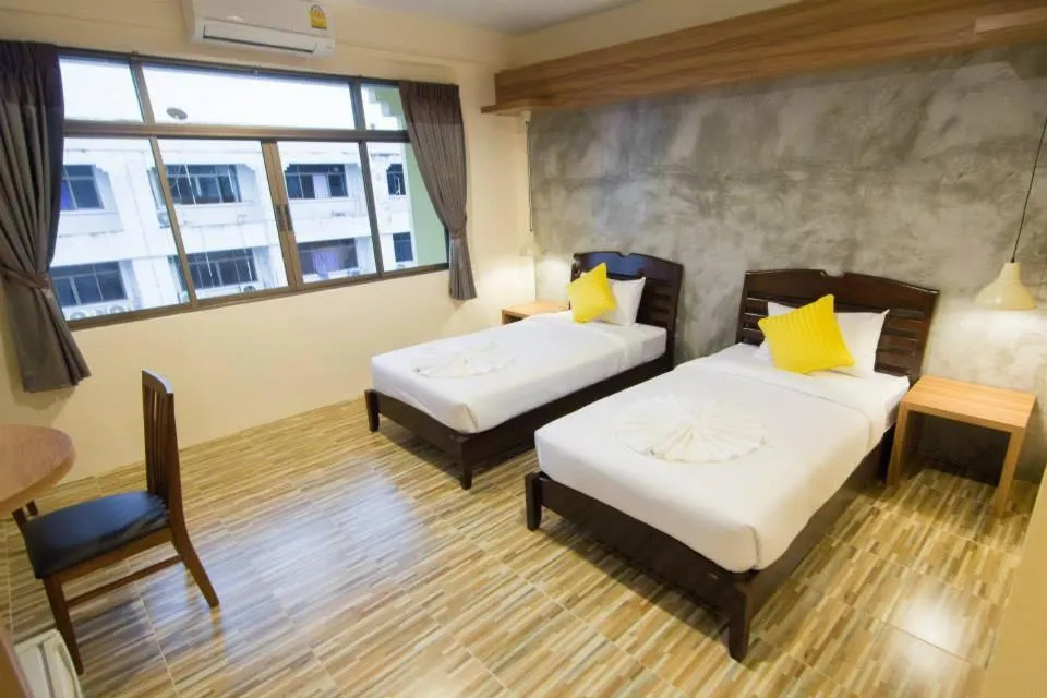 Bed in K.L. Boutique Hotel