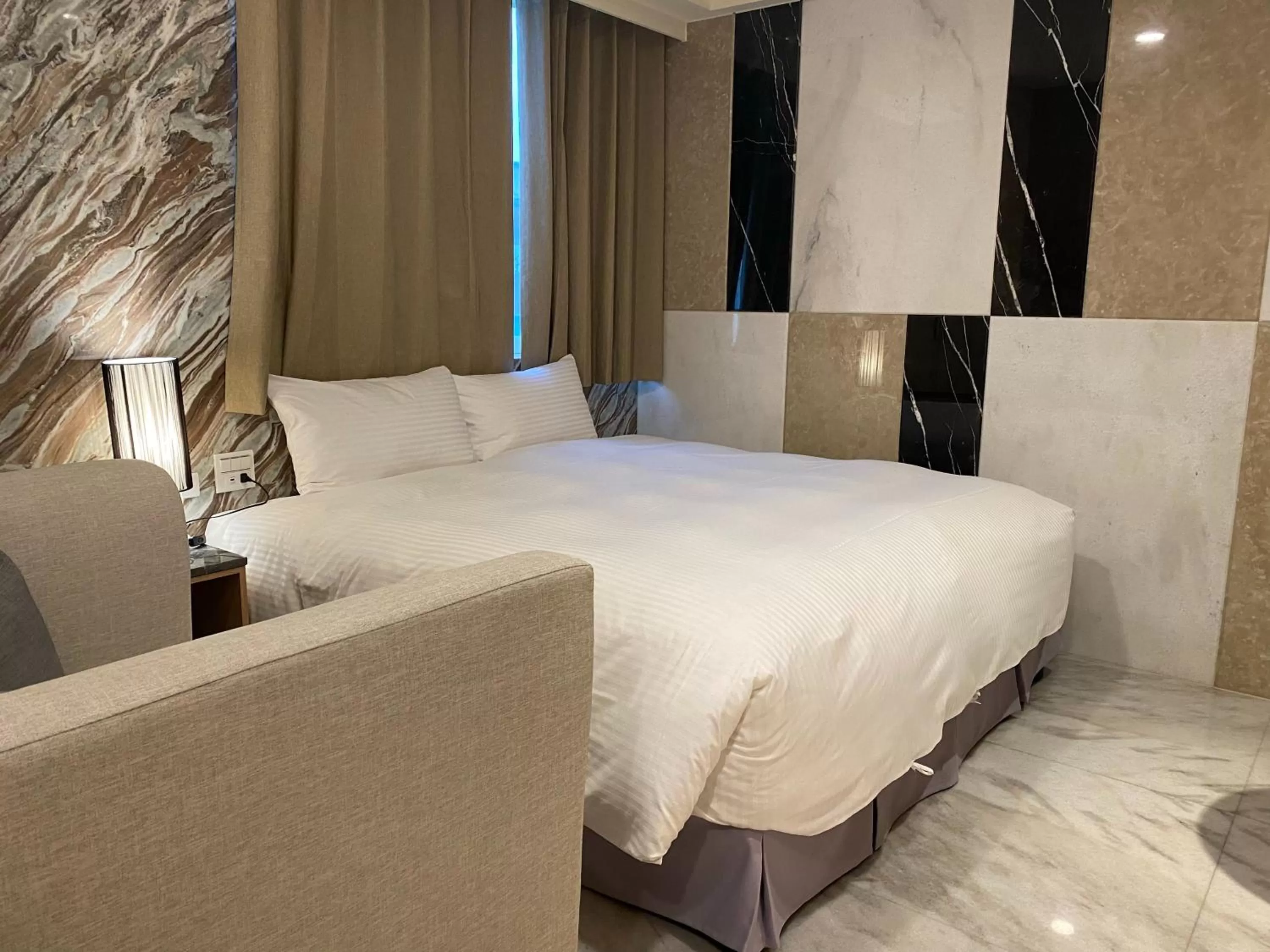 Bed in Hotel Maple Taiwan Boulevard