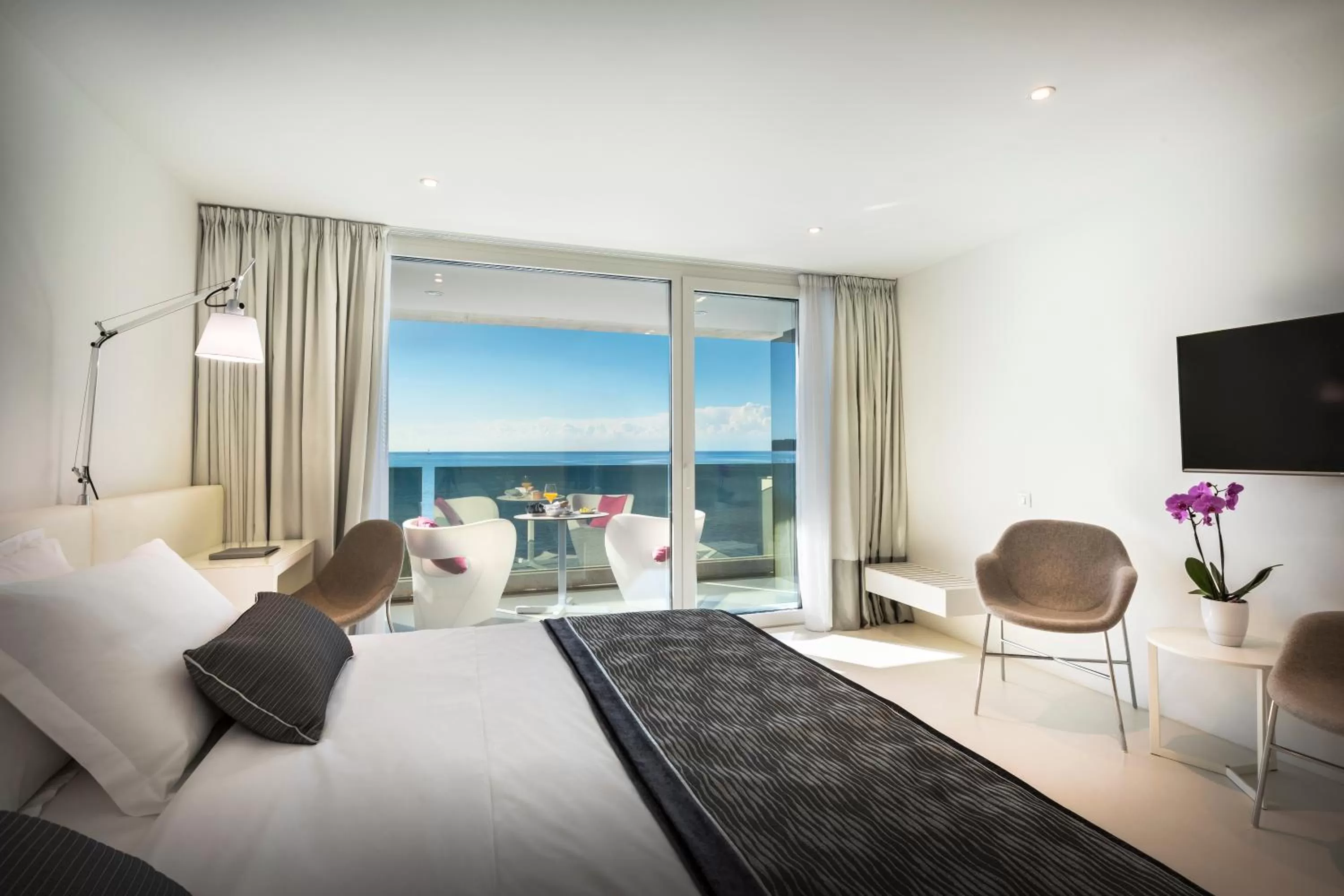 Photo of the whole room, Bed in RIVALMARE BEACH Boutique Hotel