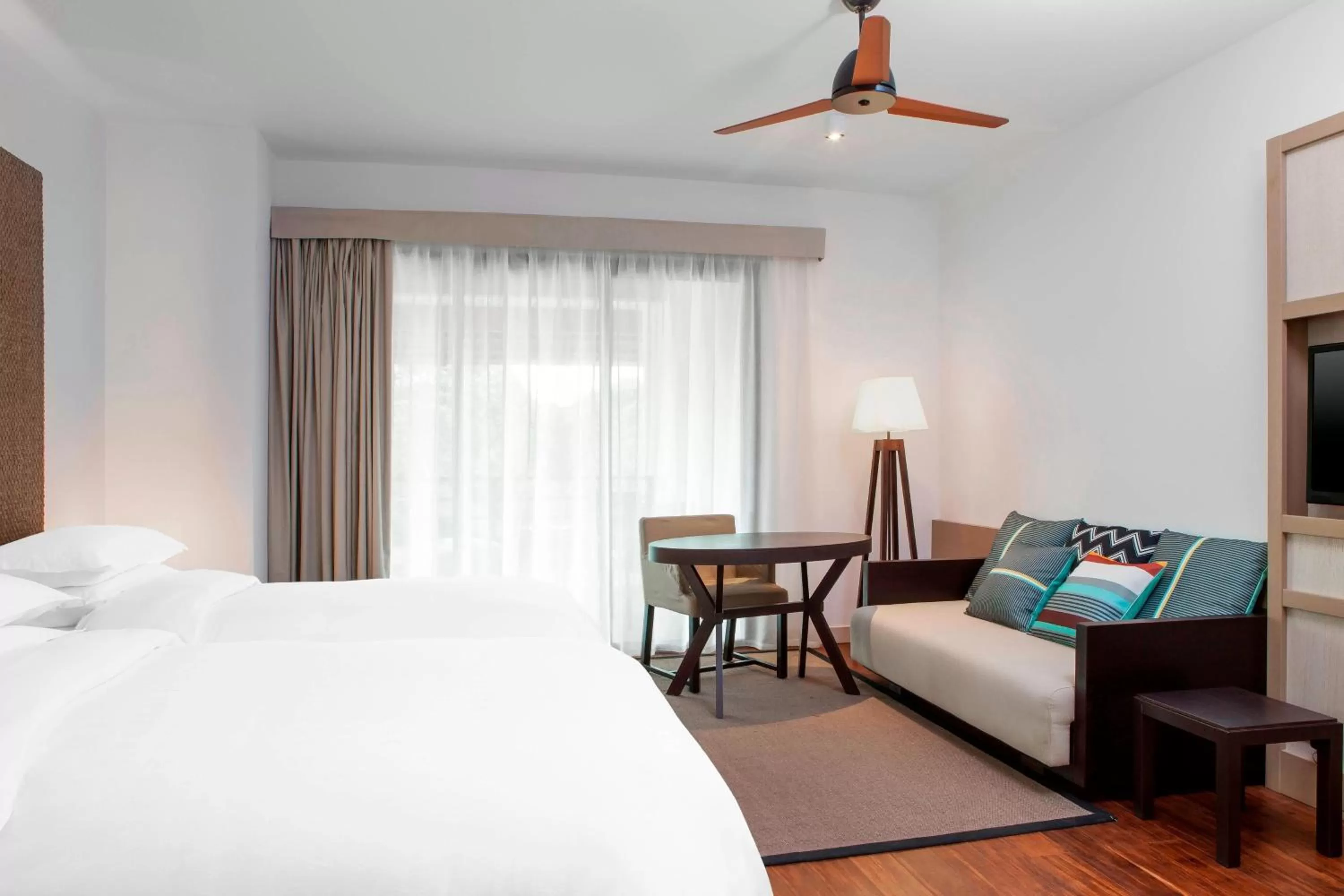 Photo of the whole room, Bed in Sheraton New Caledonia Deva Spa & Golf Resort