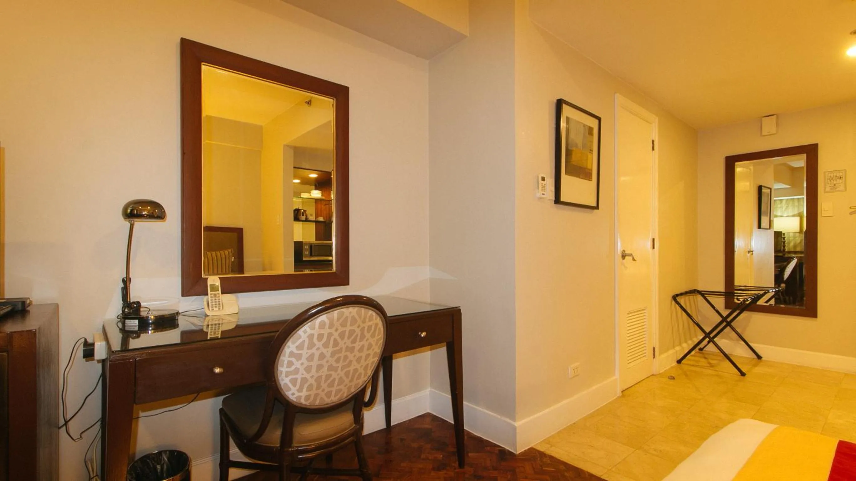 Seating area in RedDoorz Premium at The Residences Olympia Makati