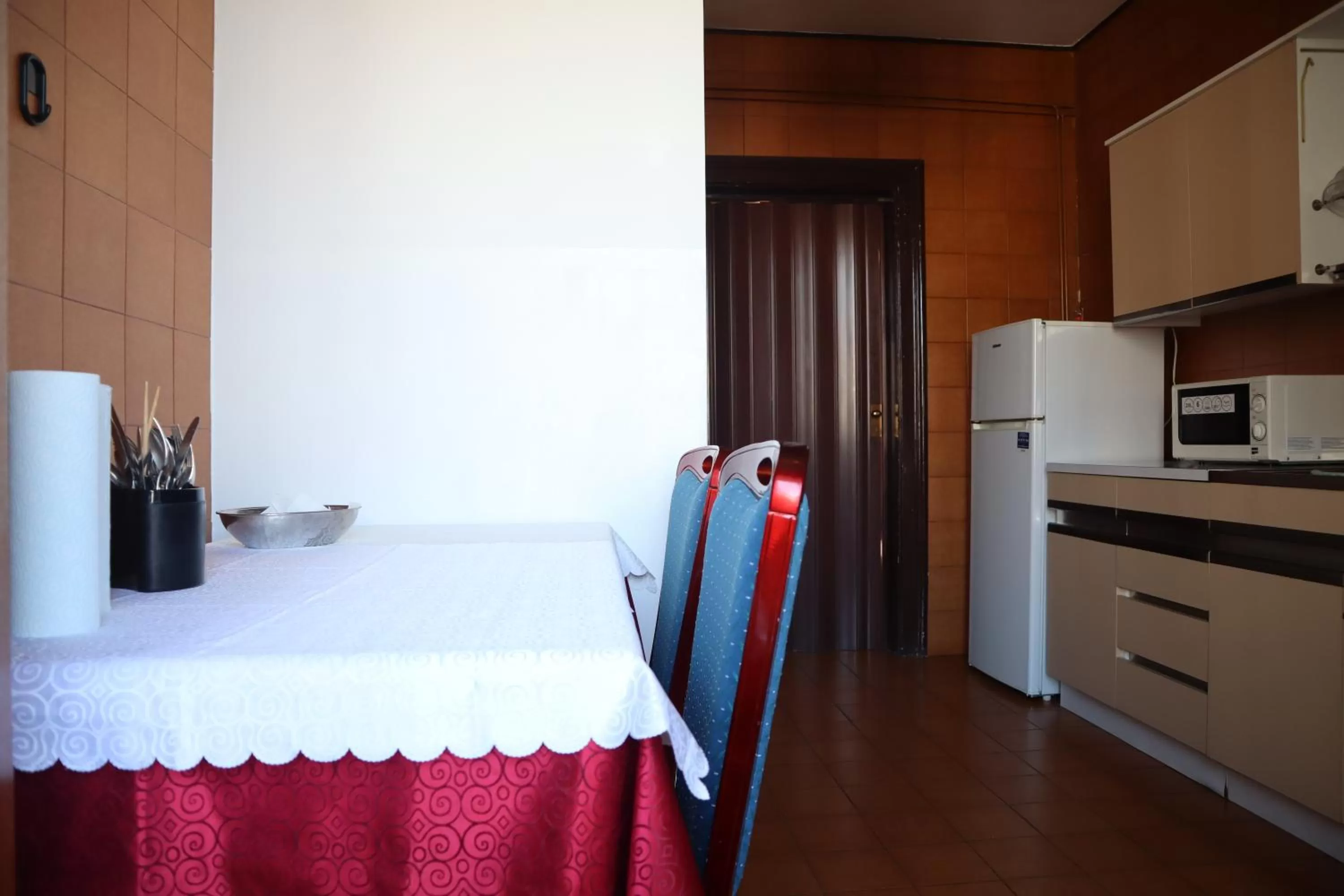 Kitchen or kitchenette, Bed in b&b Wu Giada