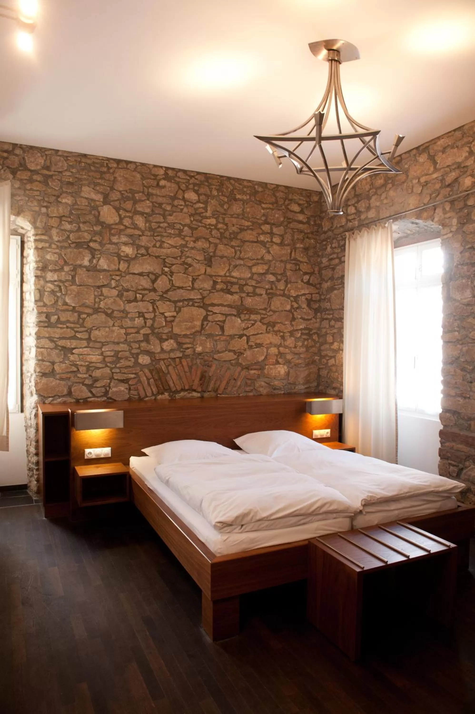 Photo of the whole room, Bed in Weinhotel Koegler