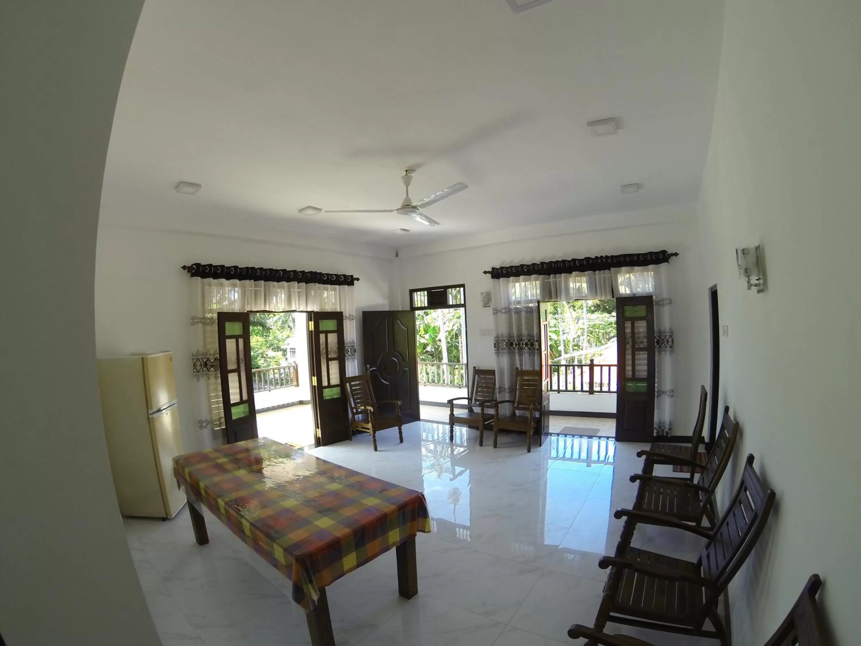 Communal lounge/ TV room, Bed in New Ocean Vibes Ahangama