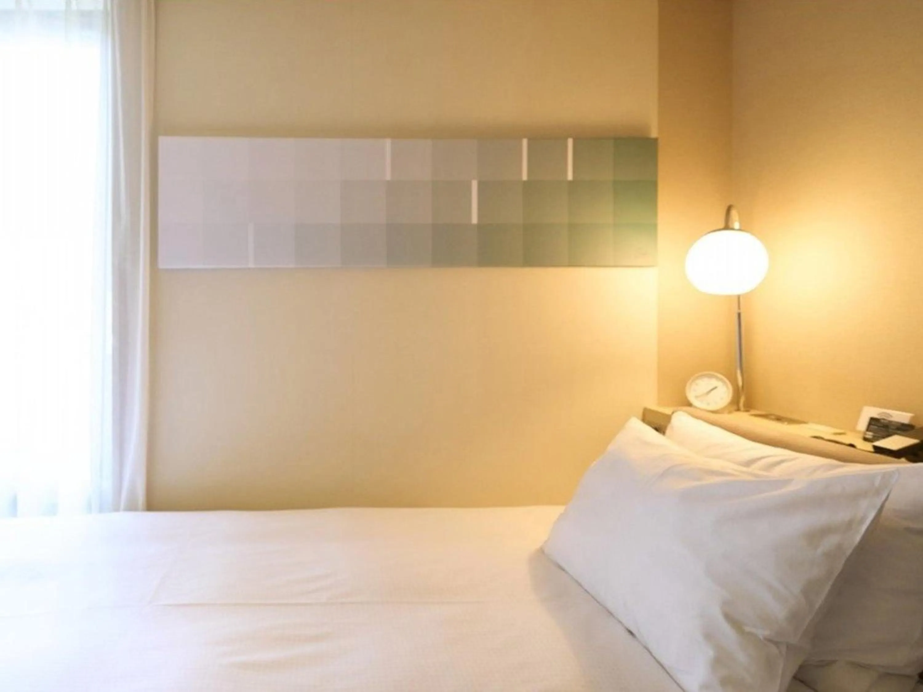 Bed in Hotel Resol Ikebukuro