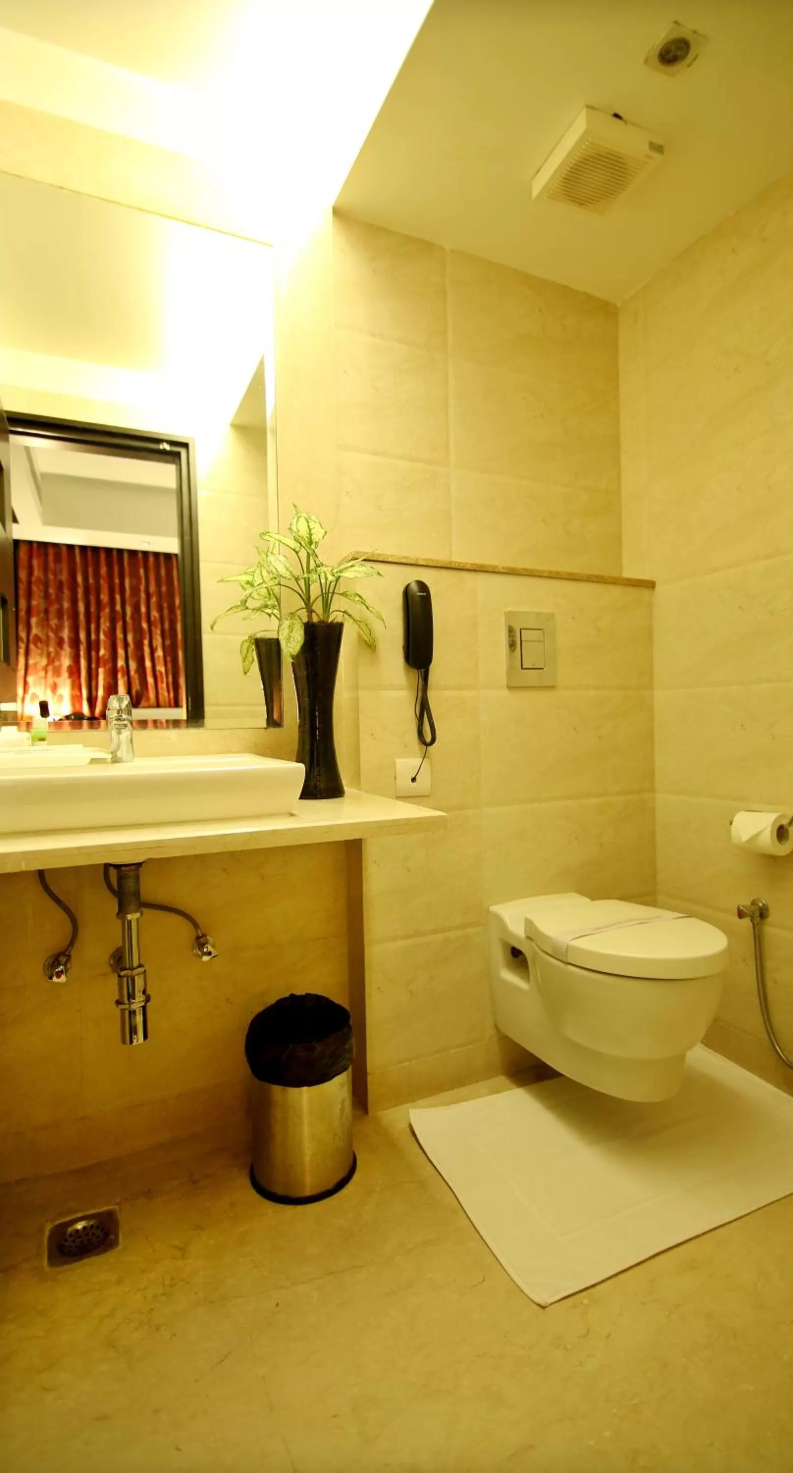 Bathroom in Hotel The Prime Balaji Deluxe, City Centre, With Free Airport Pickup