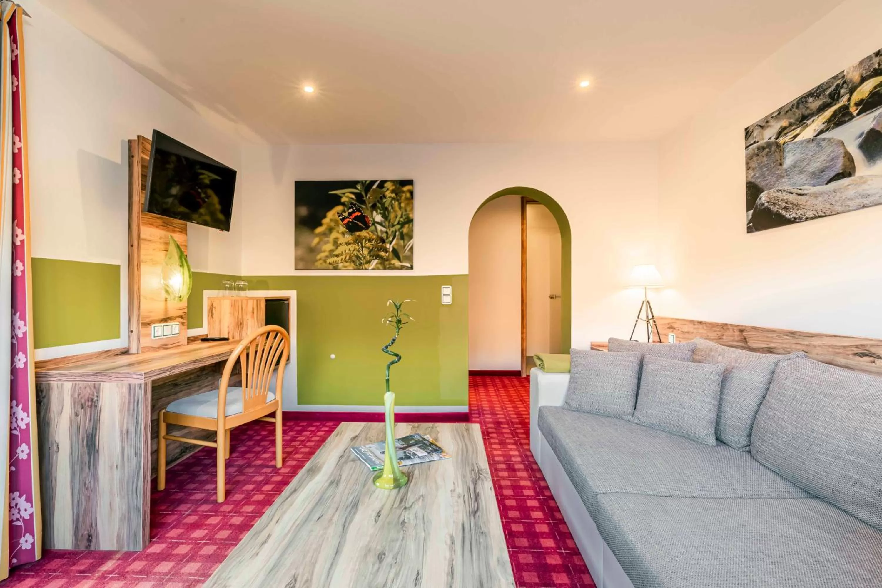 Communal lounge/ TV room in Landhotel GrünWies -Bonsai-Wellness Garni