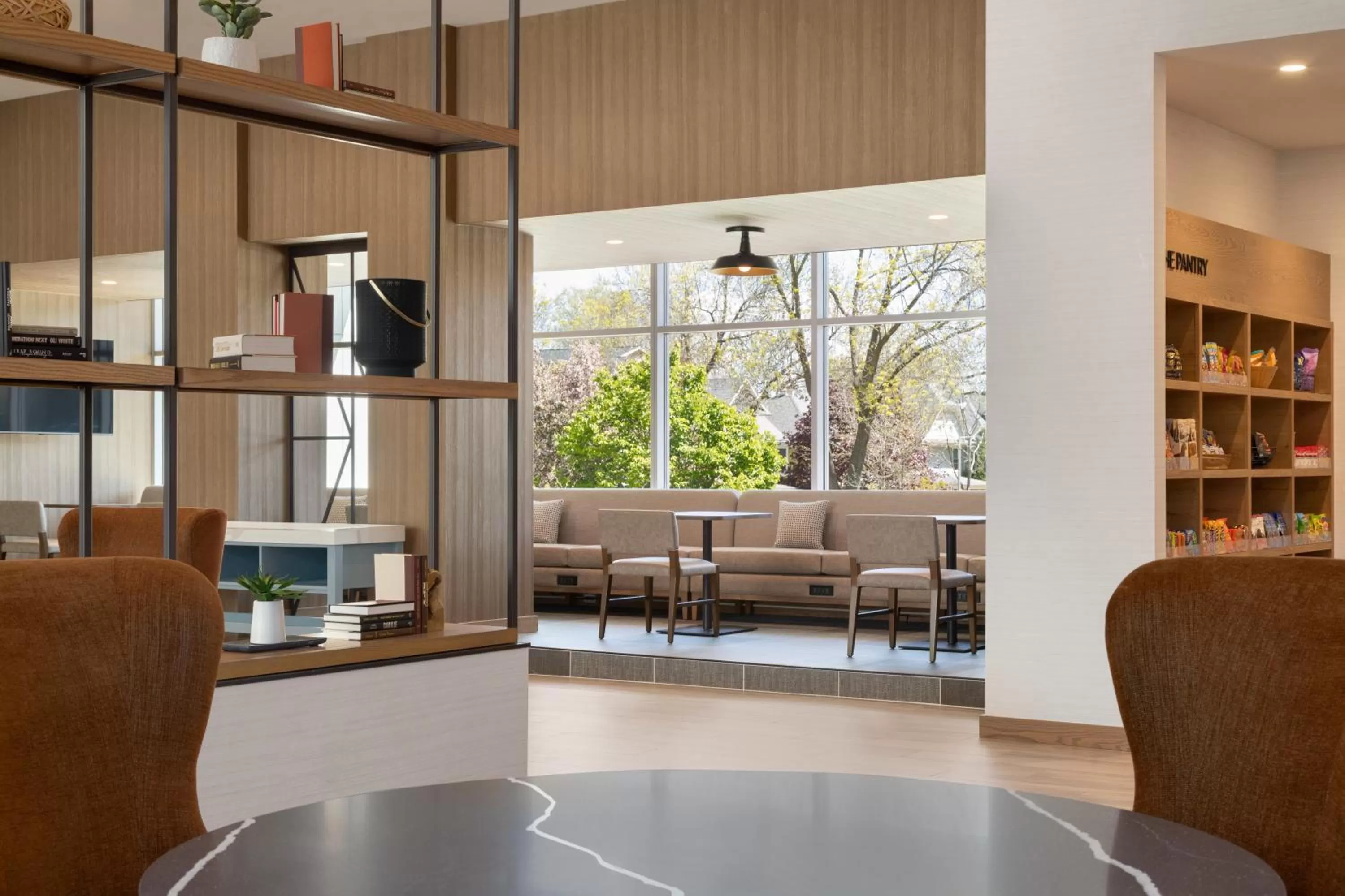 Seating area in EVEN Hotel Rochester - Mayo Clinic Area by IHG