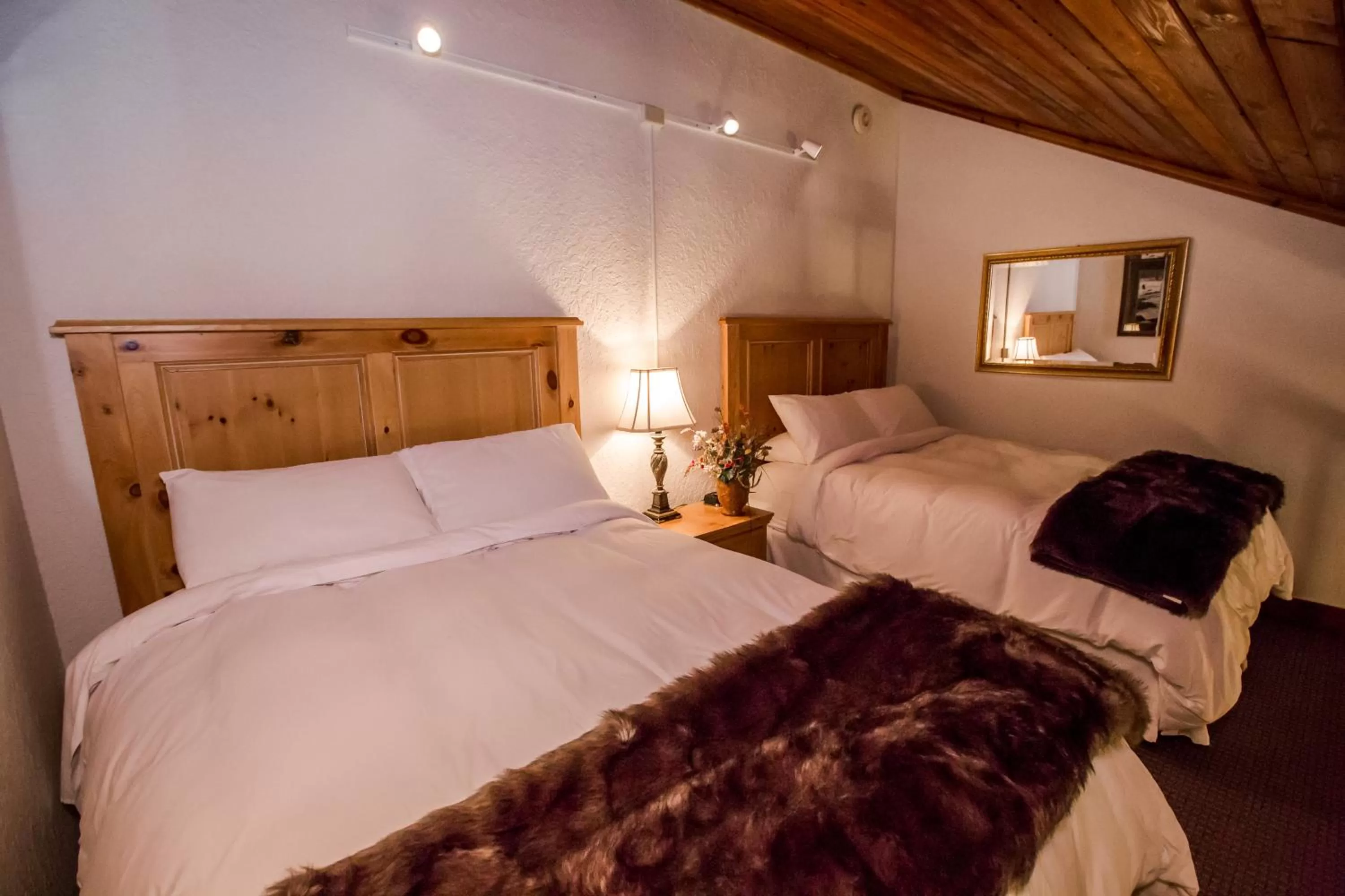 Photo of the whole room, Bed in Kandahar Lodge at Whitefish Mountain Resort