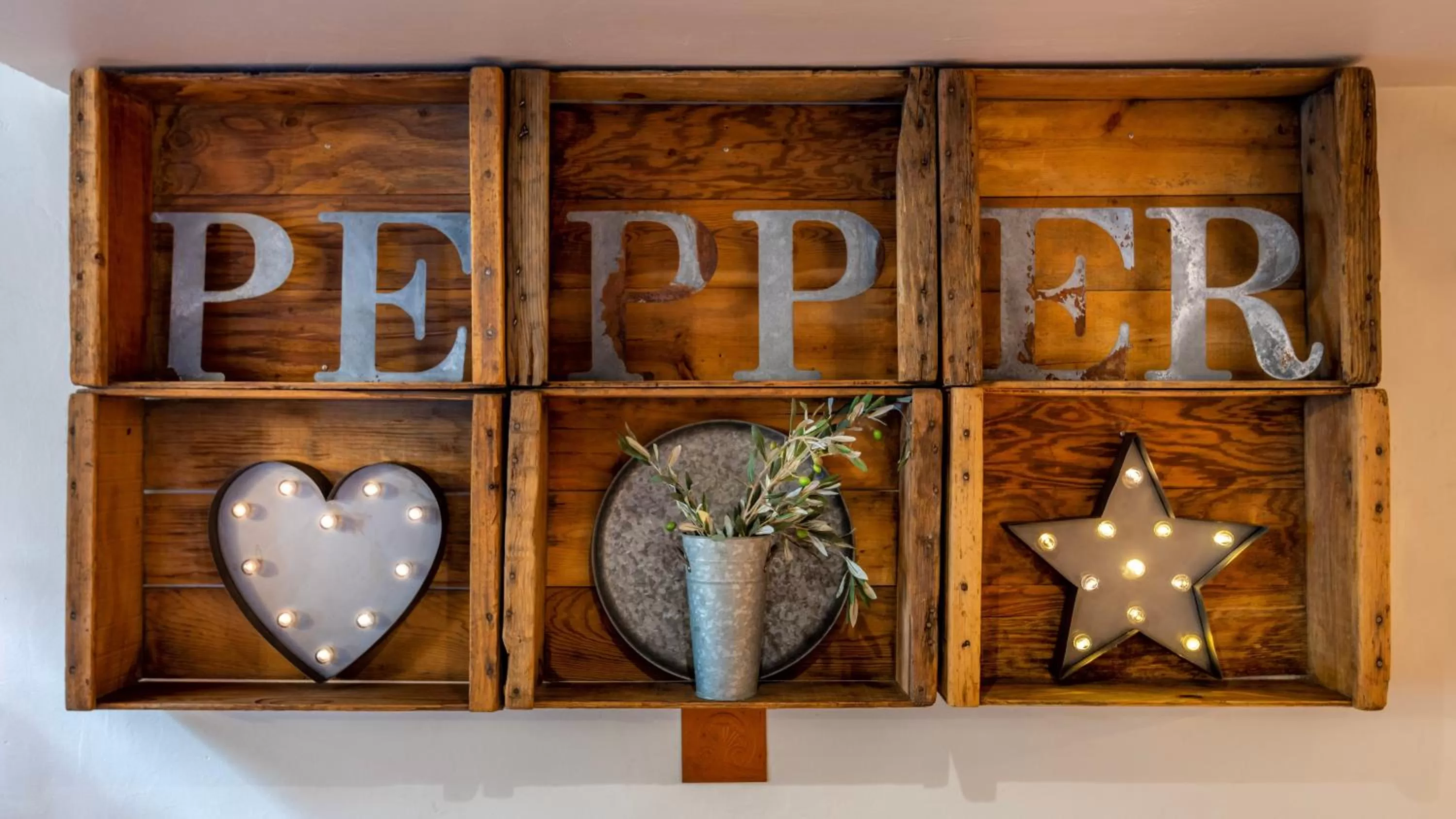 Property logo or sign in Hotel Pepper Tree Boutique Kitchen Studios - Anaheim