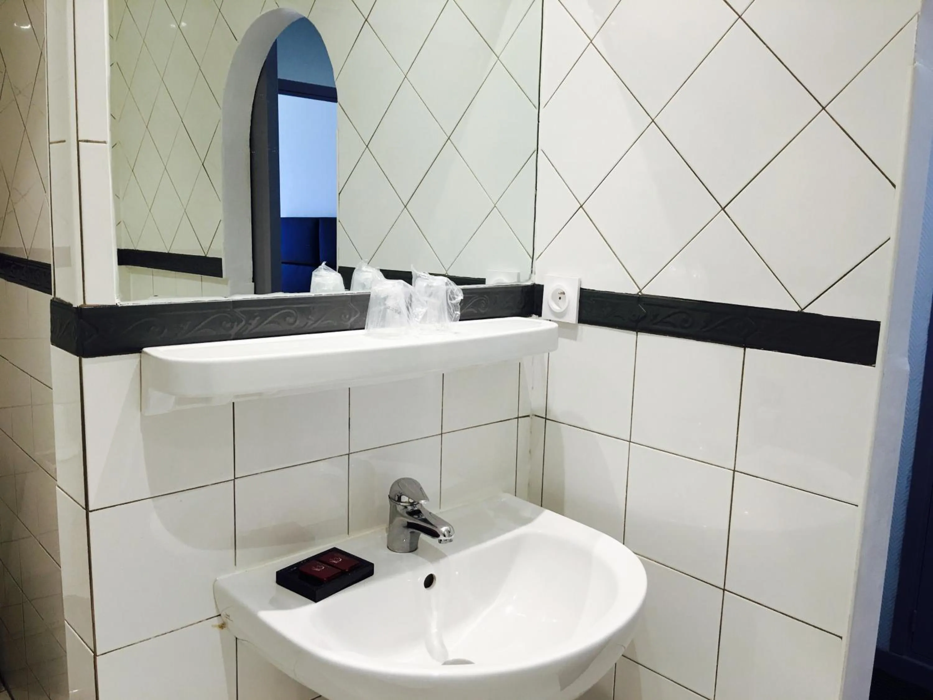 Bathroom in Hôtel Le Capitole