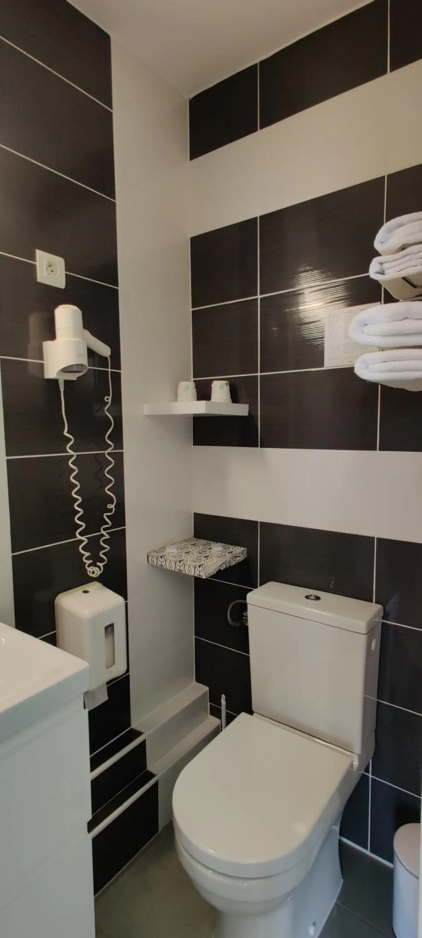 Bathroom in Logis Hôtel Les Bleuets