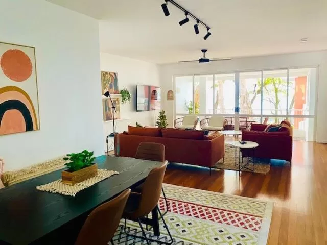 Seating area in BeachView Apartments at Villa Paradiso