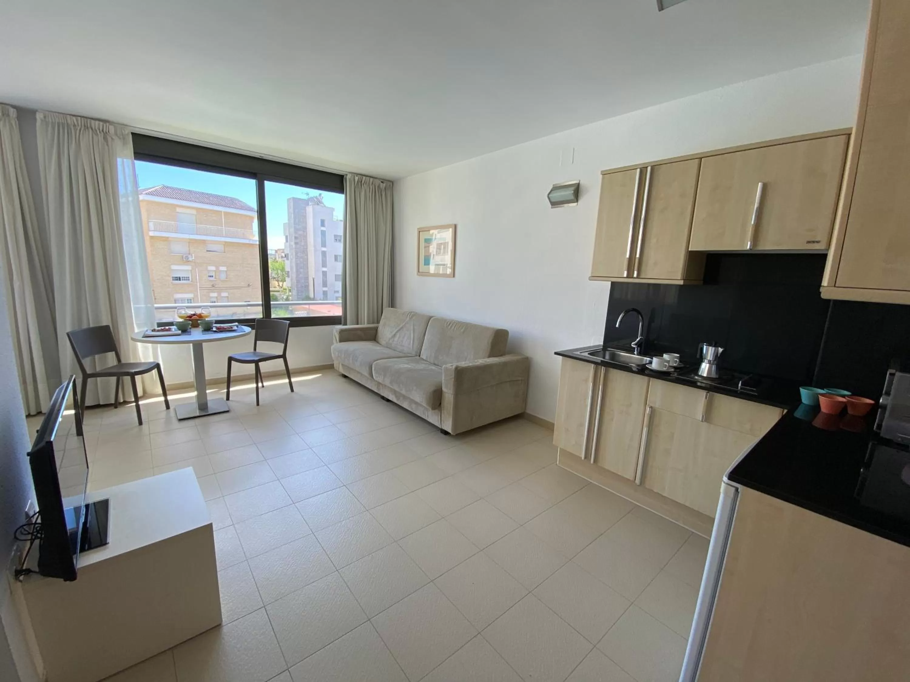 Kitchen or kitchenette in Atenea Park Suites & Apartments