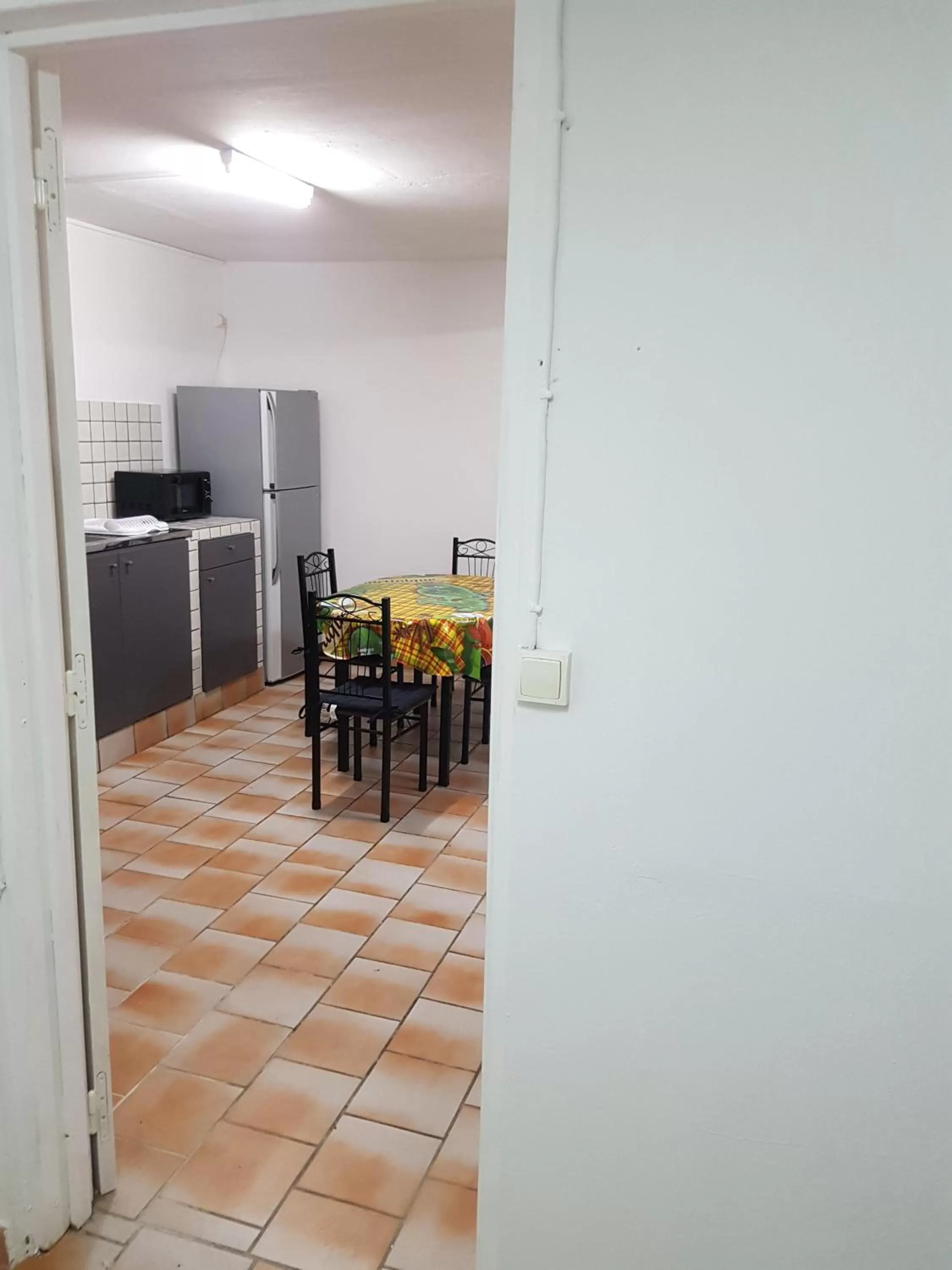 Kitchen or kitchenette in Appartement de la Baie