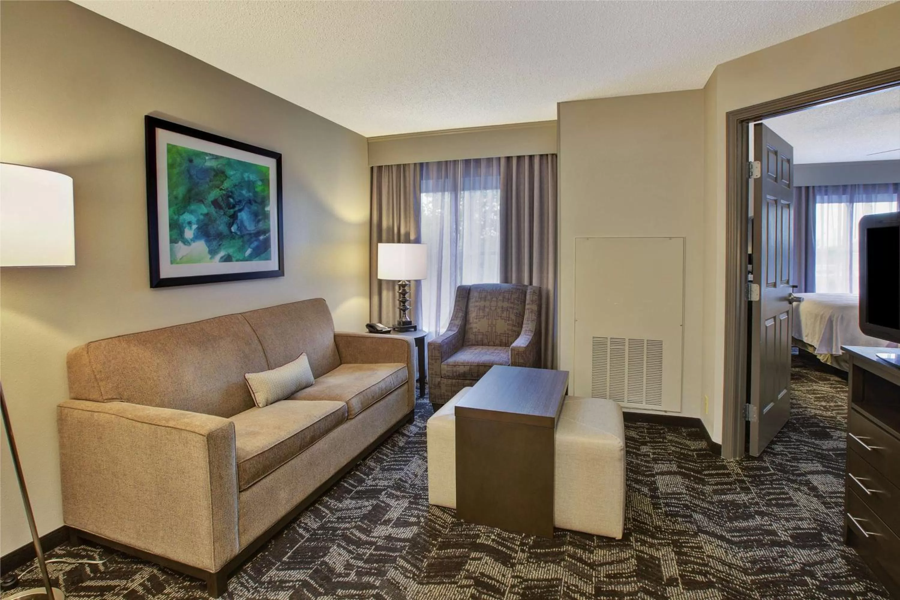Living room in Homewood Suites by Hilton Dayton South