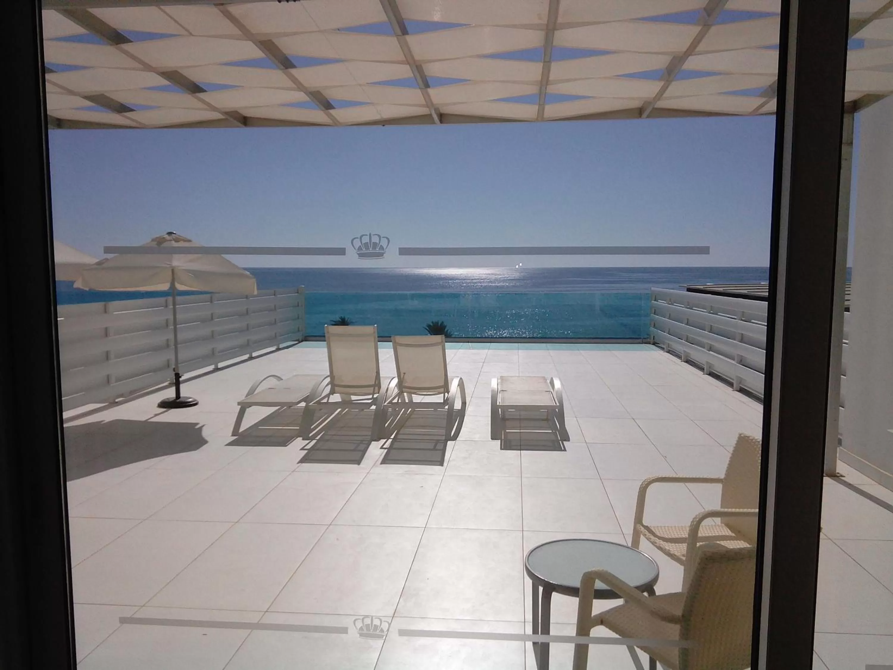 Balcony/Terrace in King Evelthon Beach Hotel & Resort