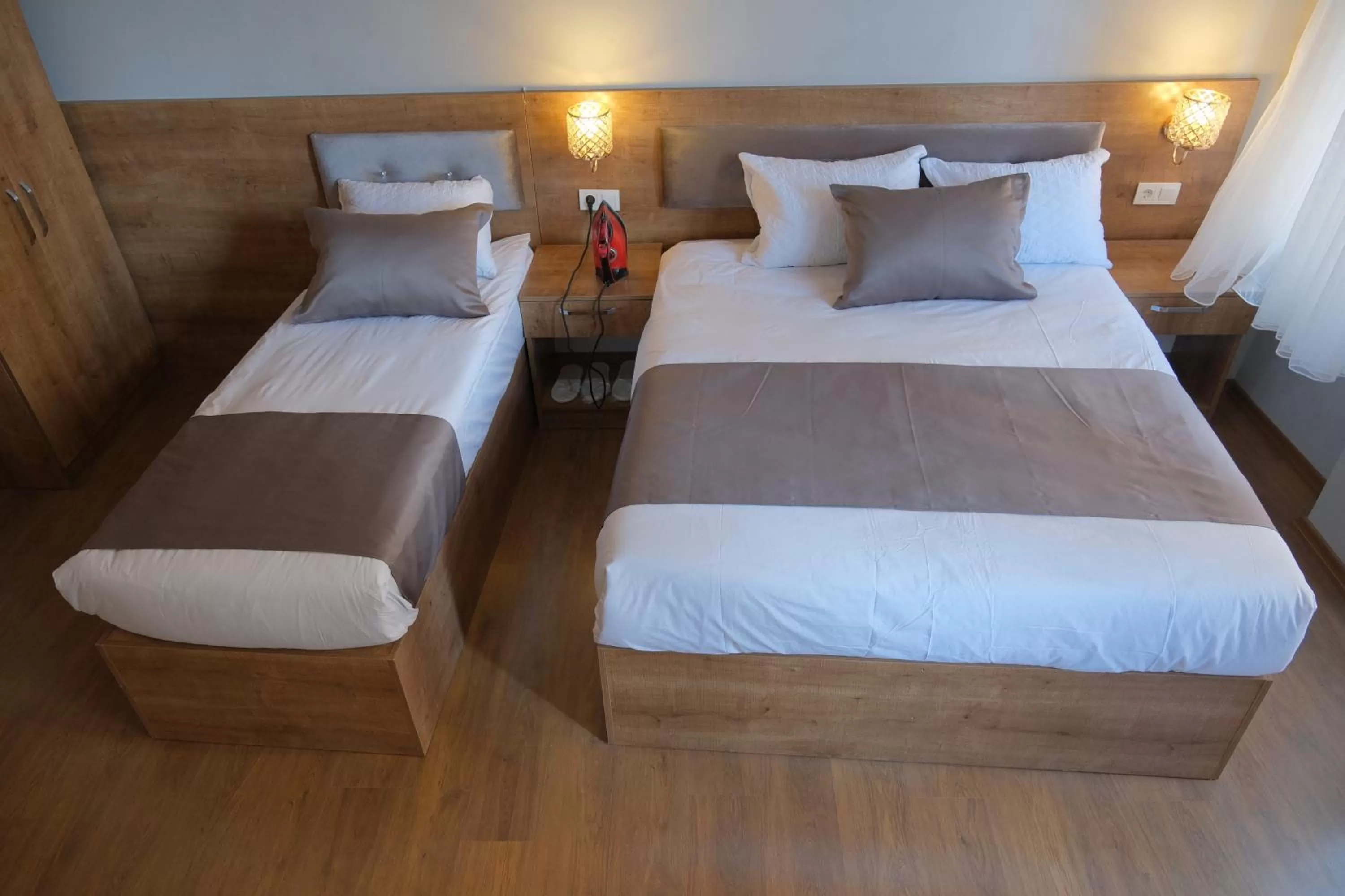 Bed in Adamantides Hotel