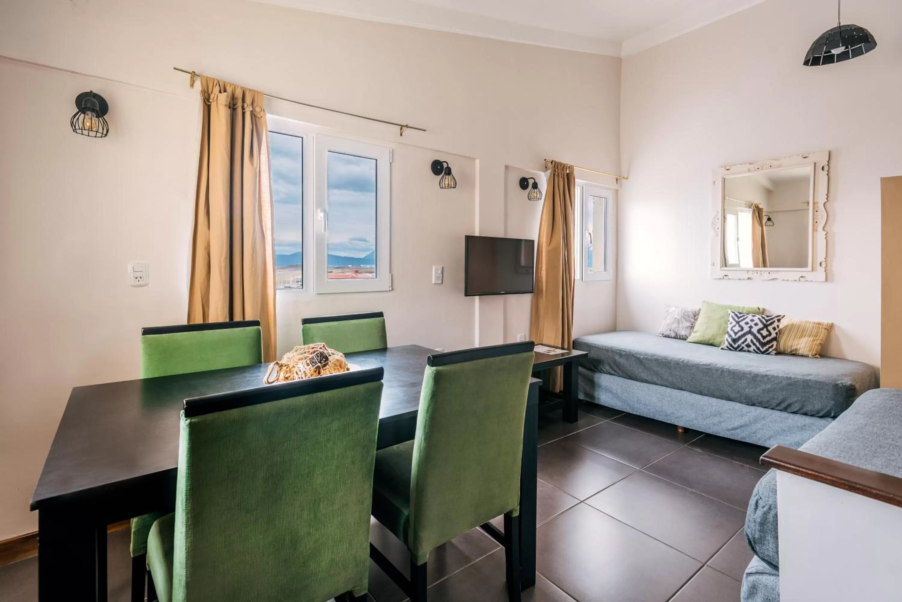 Communal lounge/ TV room in Riviera Fueguina Apartments