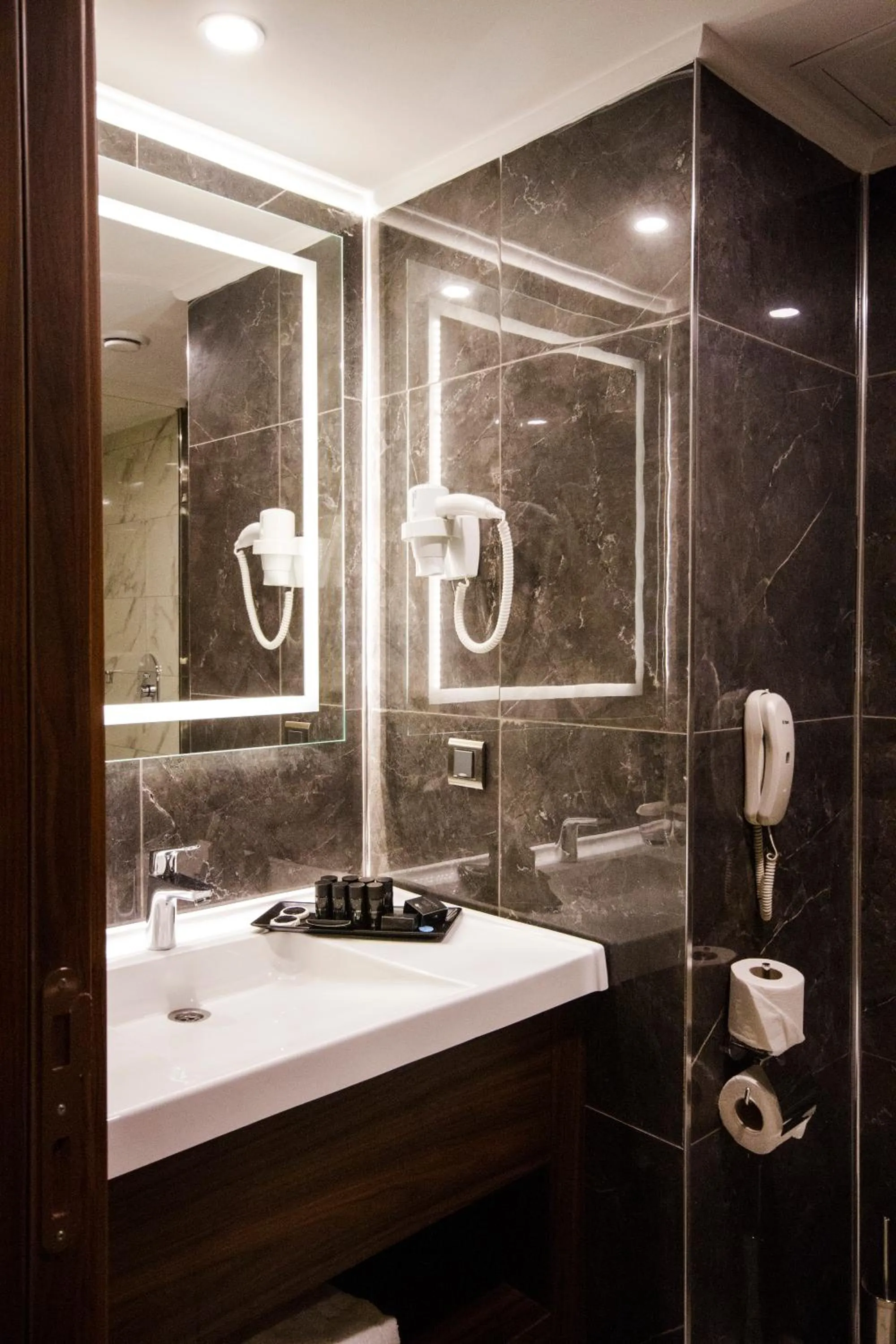 Bathroom in SKY Business Hotel