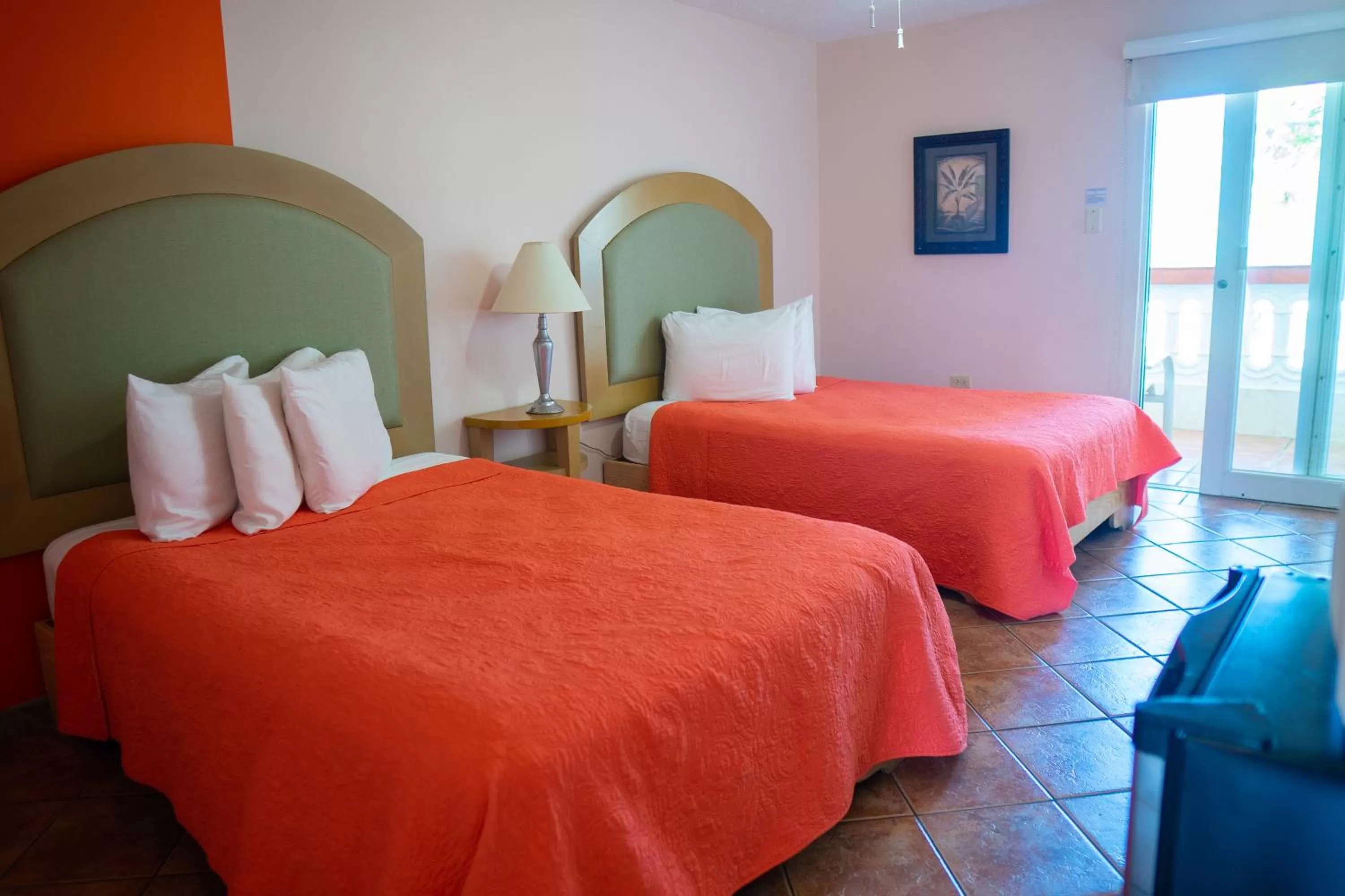 Bed in Luquillo Sunrise Beach Inn