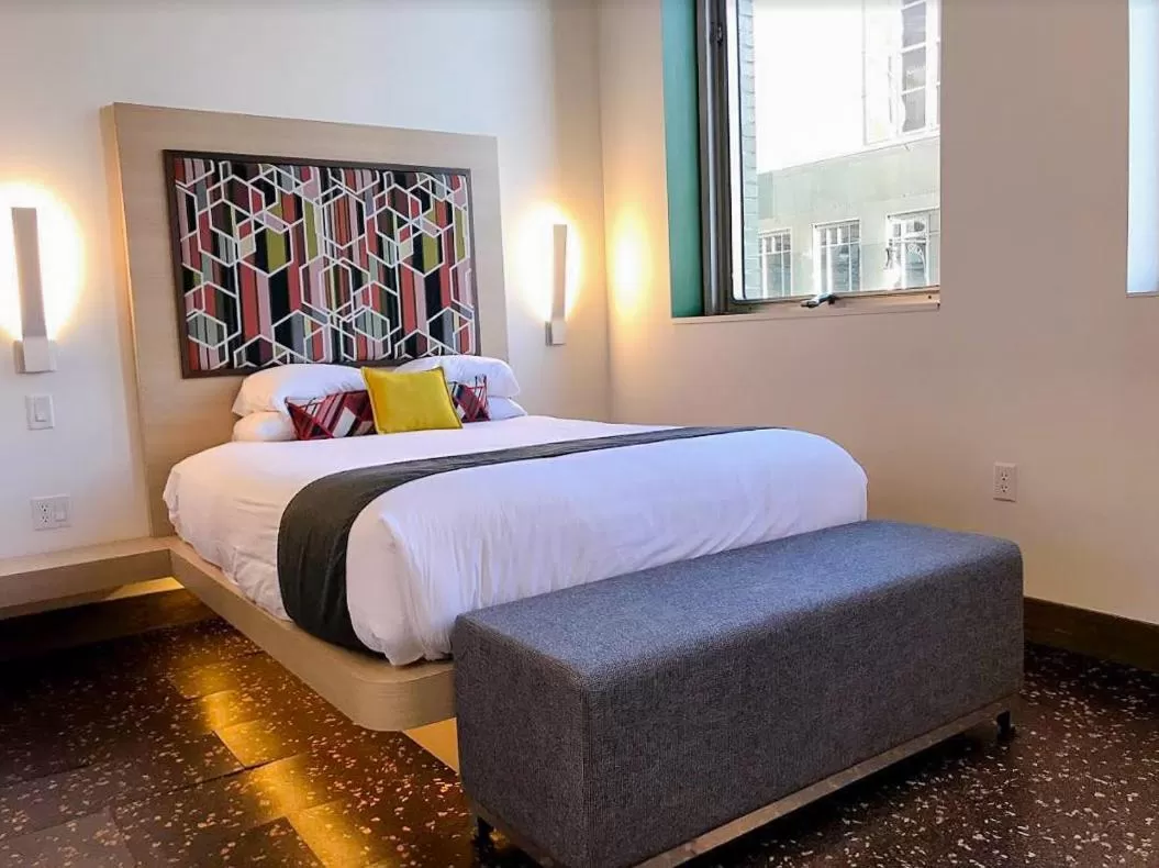 Bed in CityFlatsHotel - Grand Rapids, an Ascend Collection Hotel