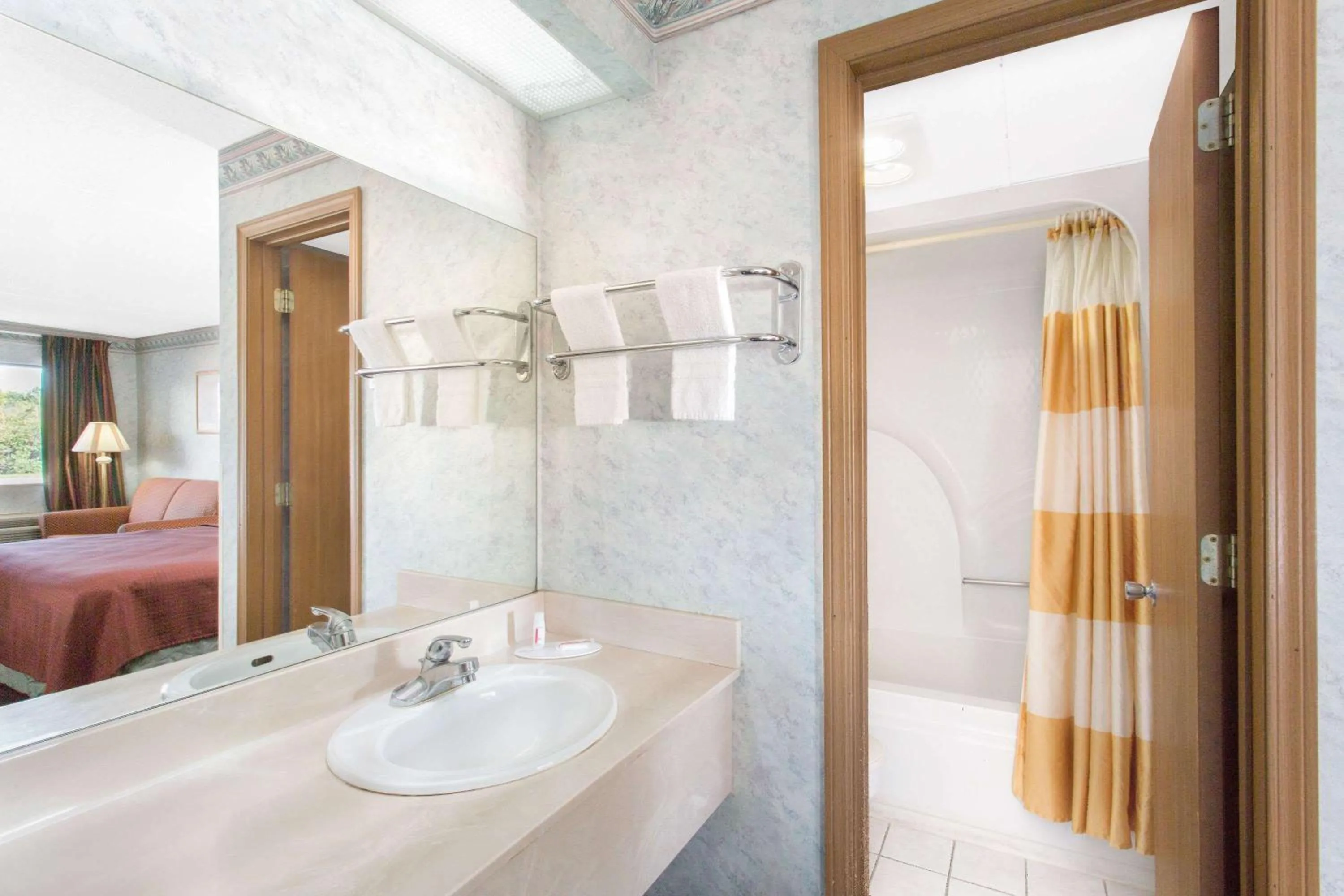 King Room - Smoking  in Days Inn & Suites by Wyndham Bentonville