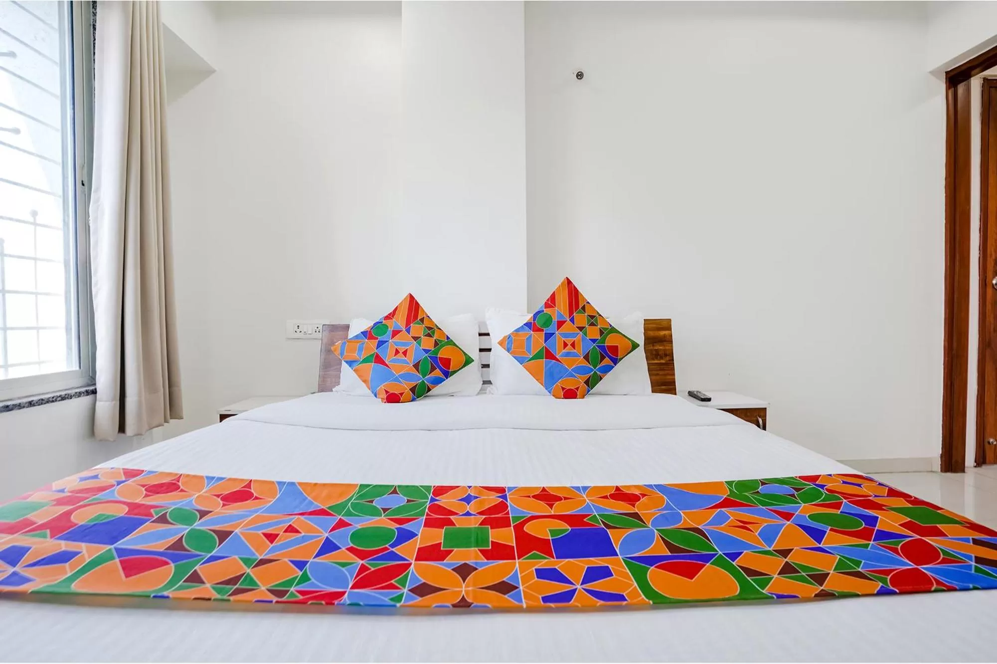 Bed in FabHotel Omkar Executive