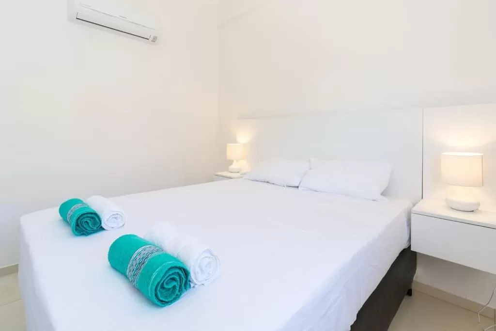 Bed in Manga Verde Beach Residence