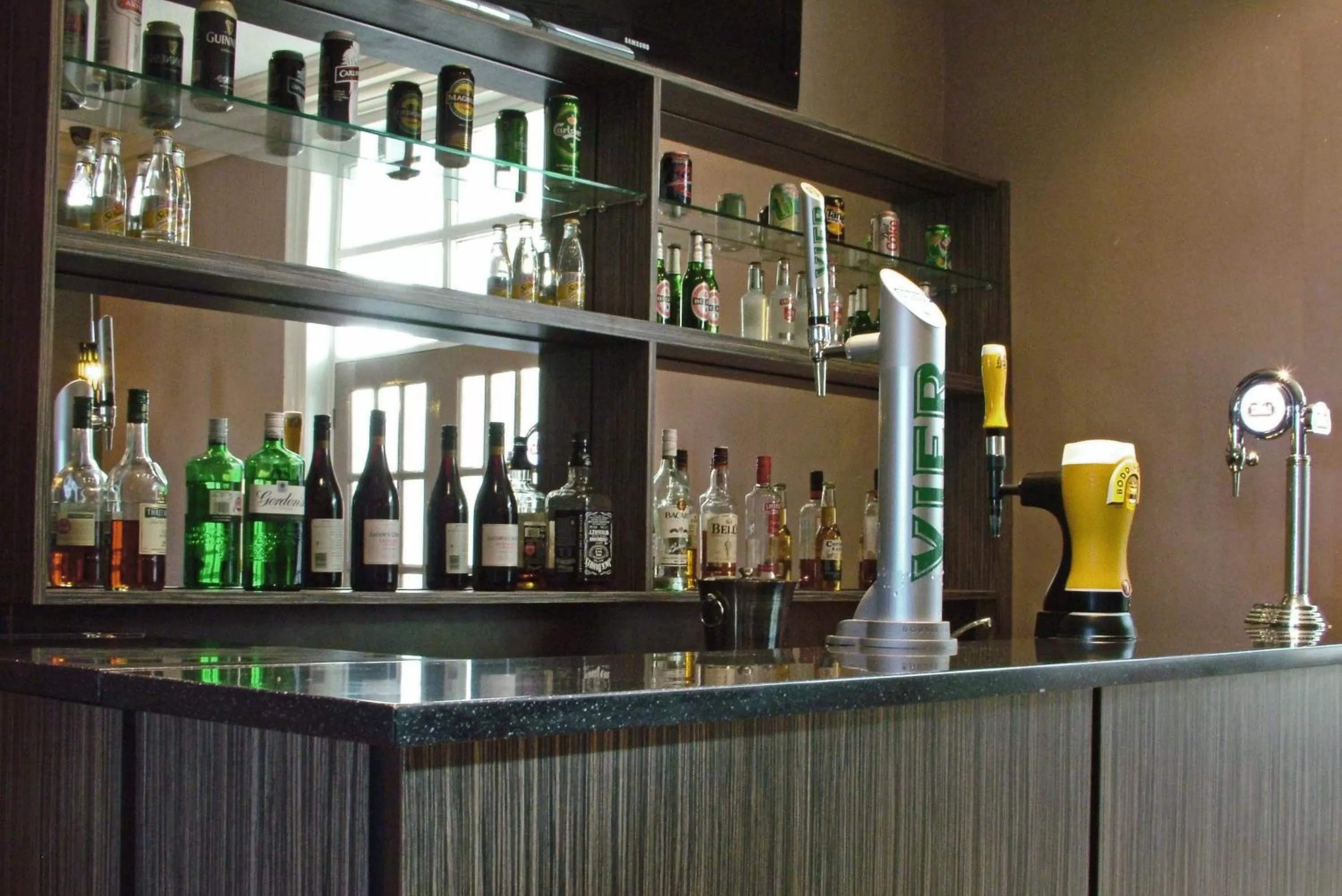 Lounge or bar in The Abbey Lodge Hotel