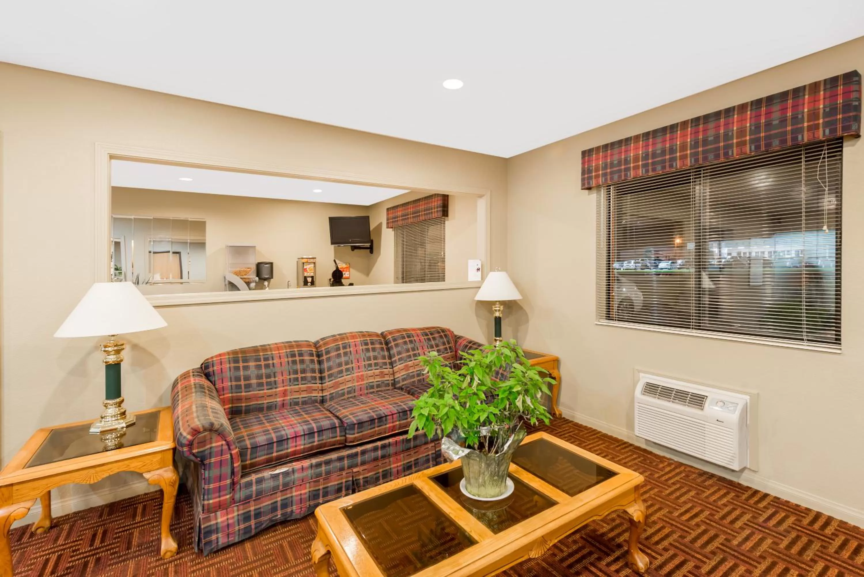 Seating area in Super 8 by Wyndham Chanute