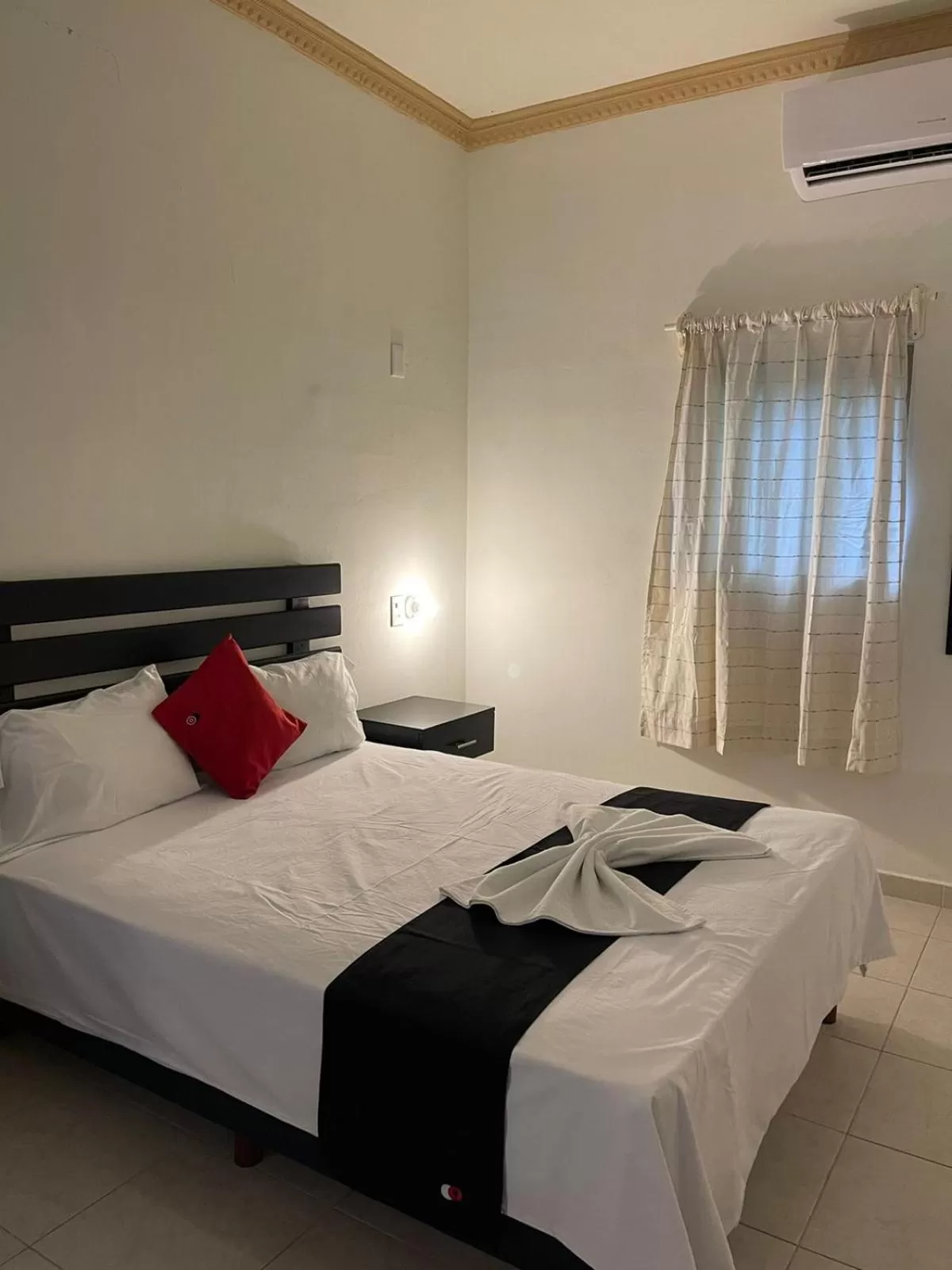 Photo of the whole room, Bed in Capital Center