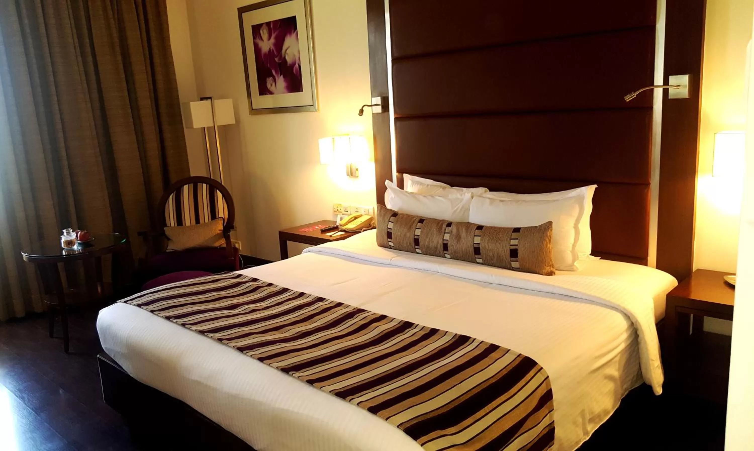 Bed in Royal Orchid Central, Pune