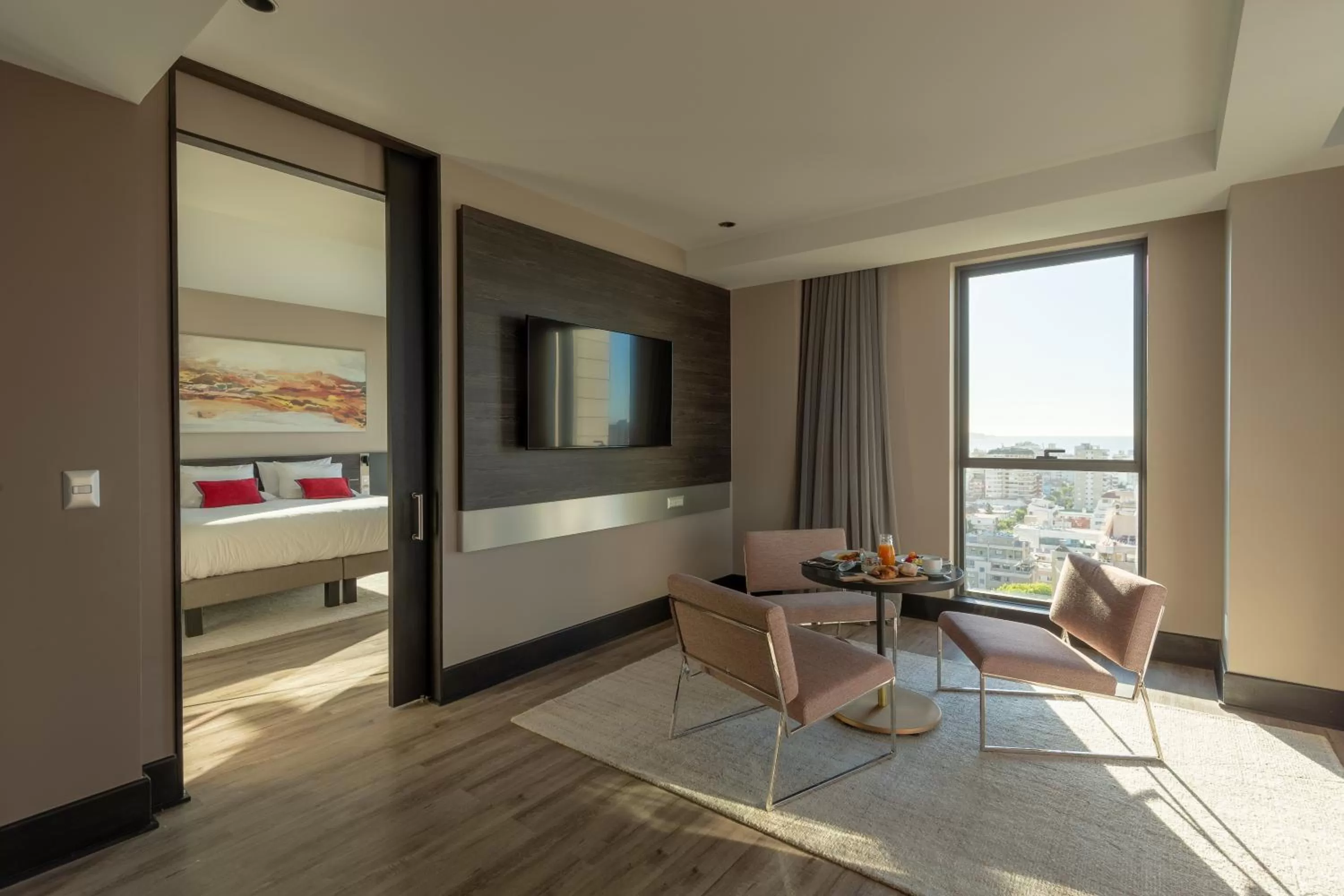 Communal lounge/ TV room, Bed in Novotel Vina del Mar