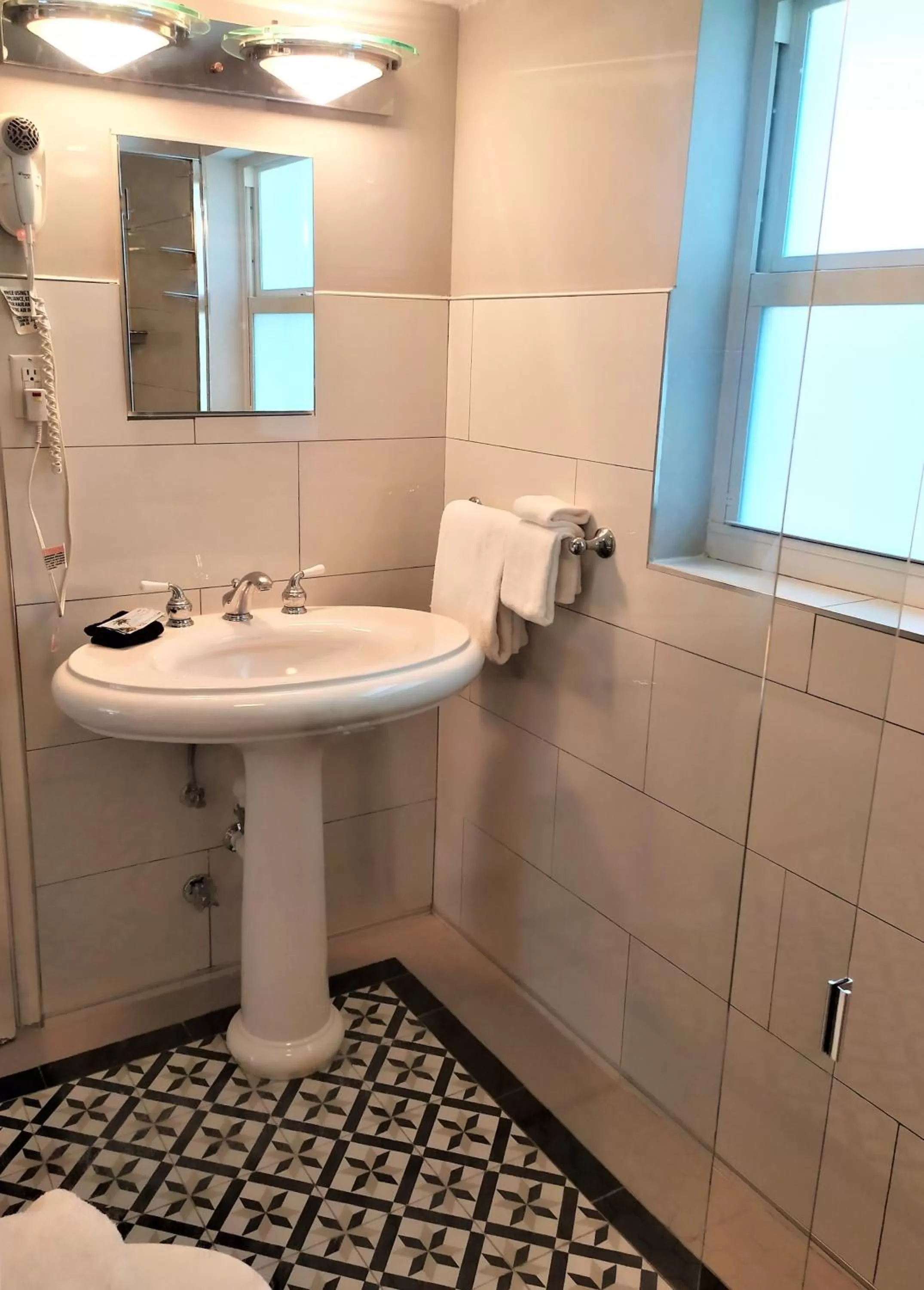 Bathroom in Manhattan Tower Apartment Hotel