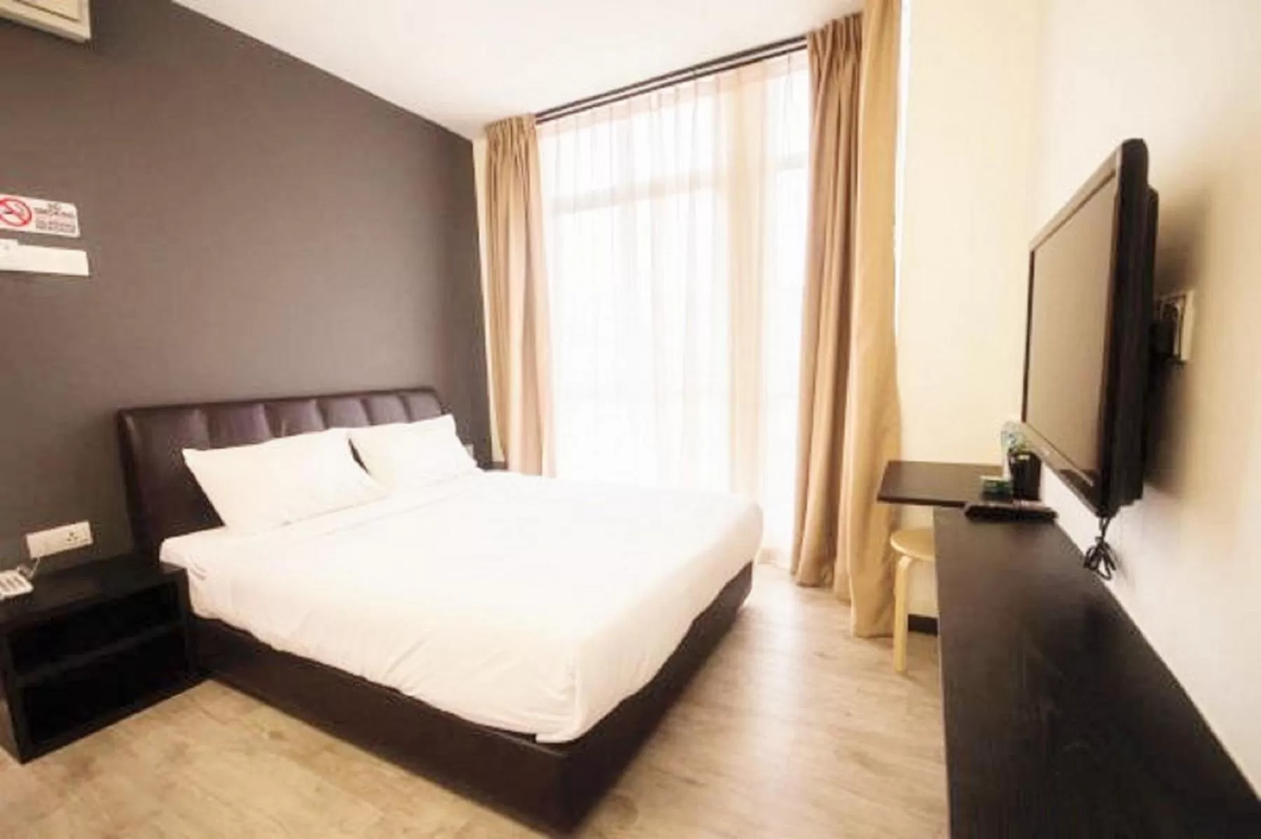 Bed in Sandy Hotel Malacca