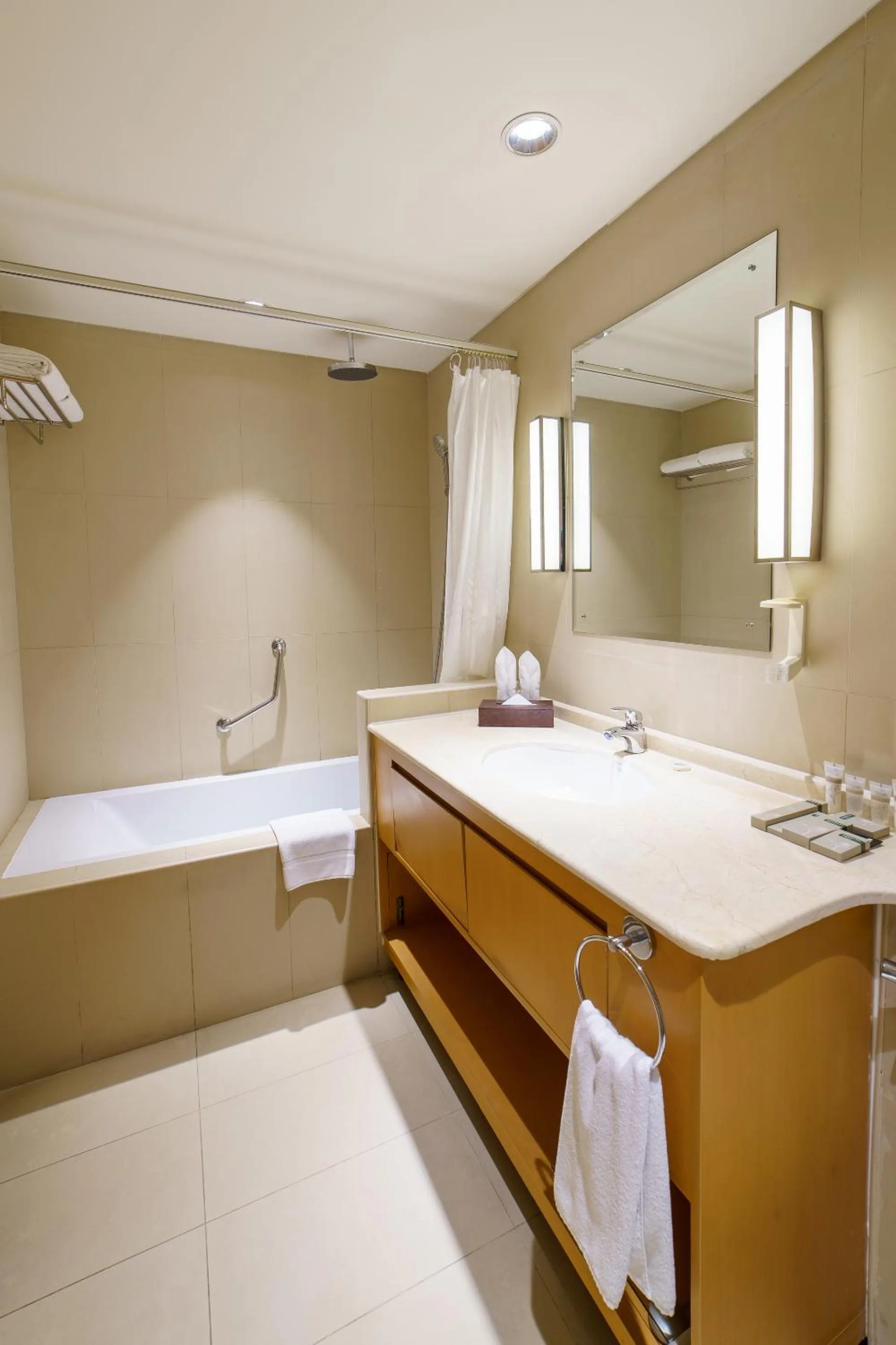 Bathroom, Bed in Levatio Suites Muscat, a member of Radisson Individuals