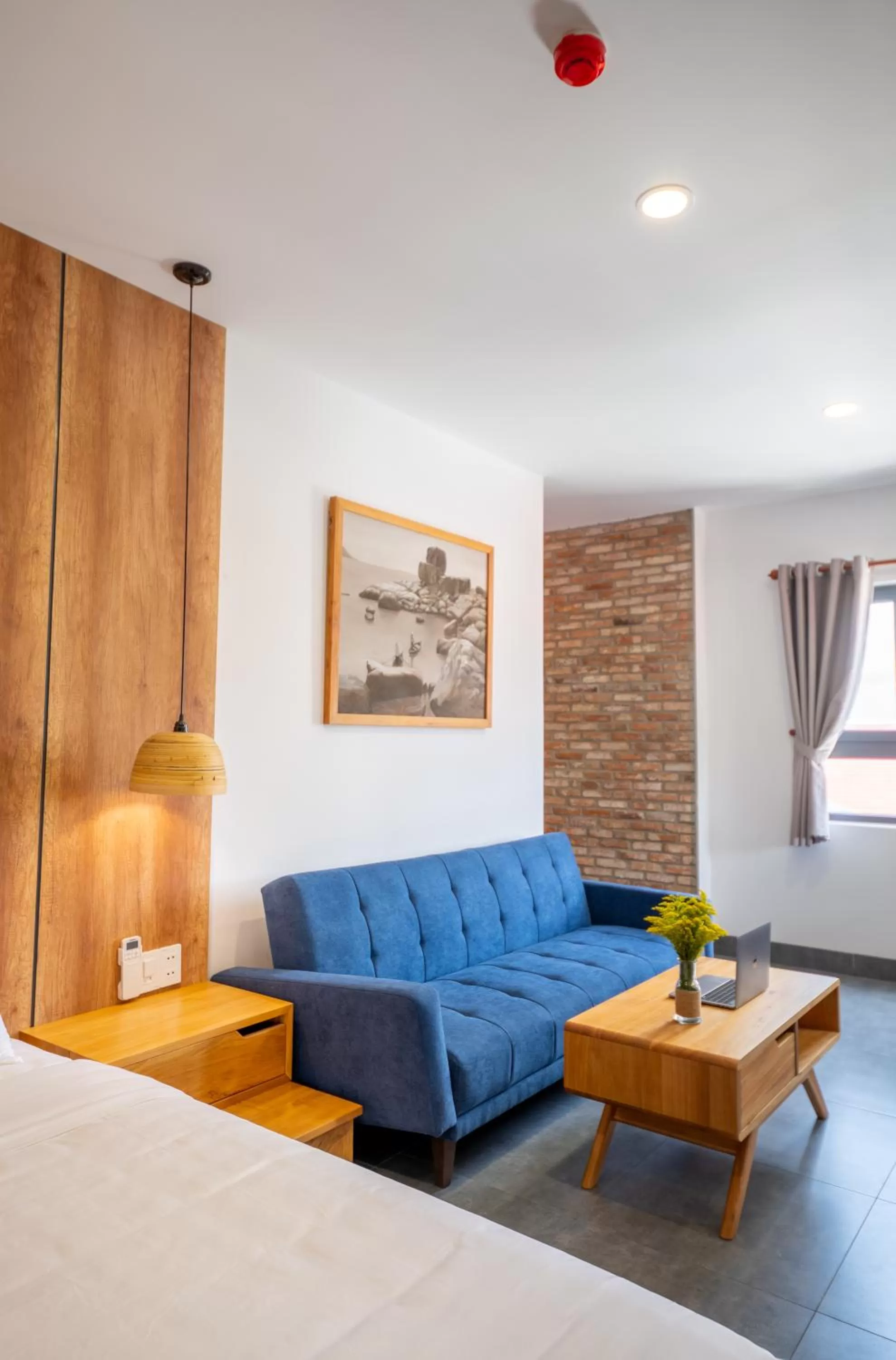 Seating area, Bed in Coast House Boutique Hotel