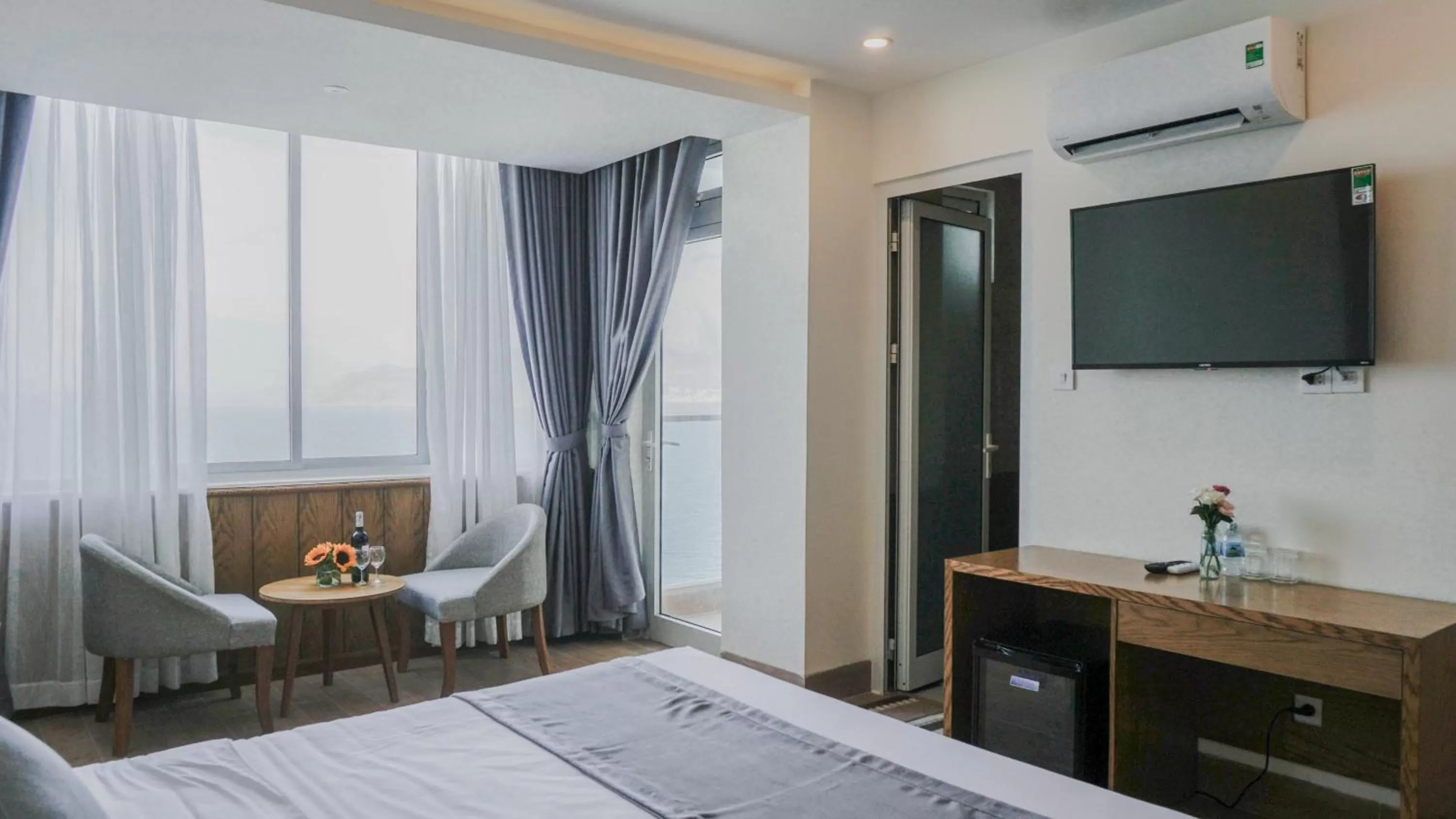 Photo of the whole room, Bed in Glory Nha Trang Hotel