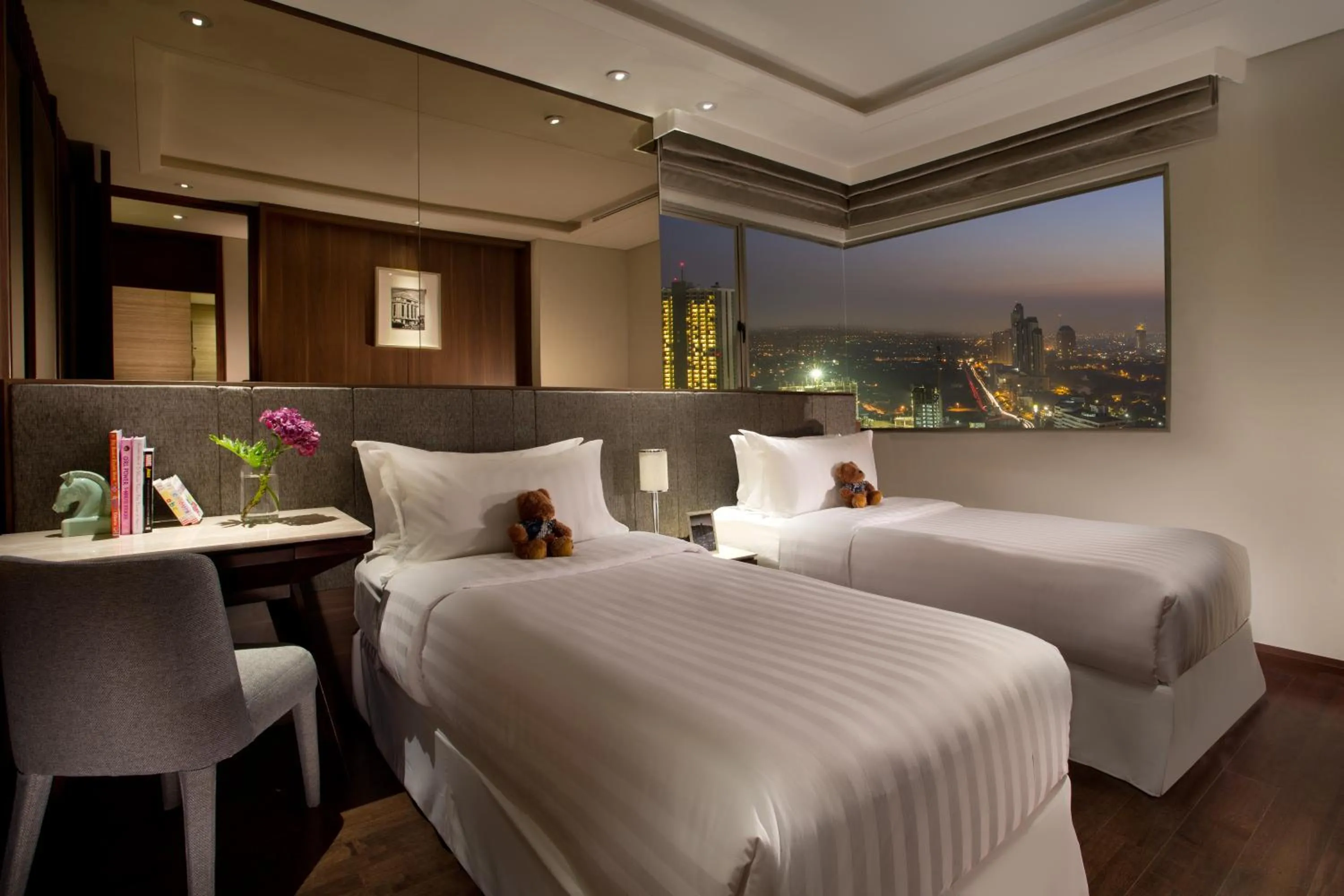 Photo of the whole room, Bed in Ascott Waterplace Surabaya