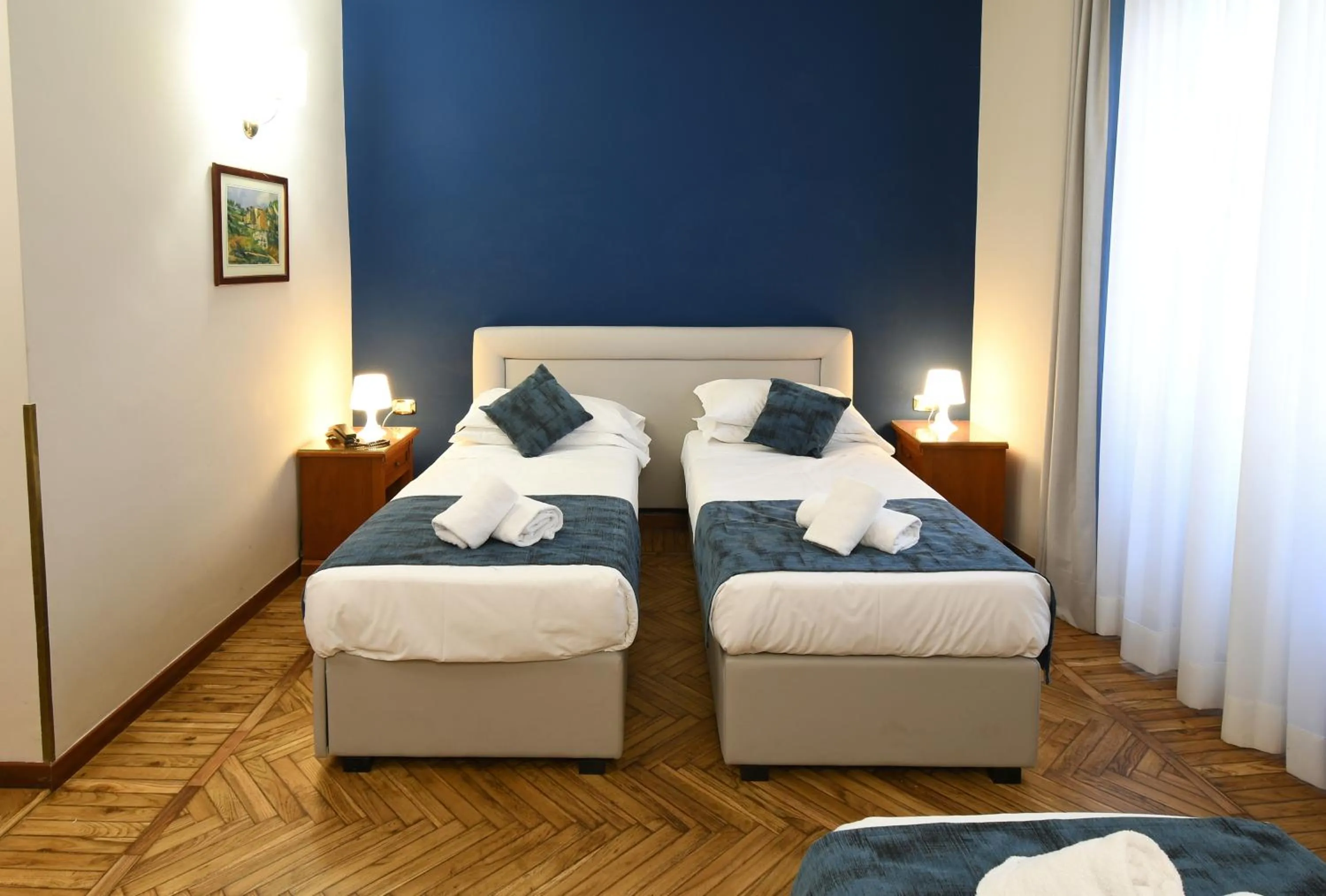 Bed in Hotel Cavour