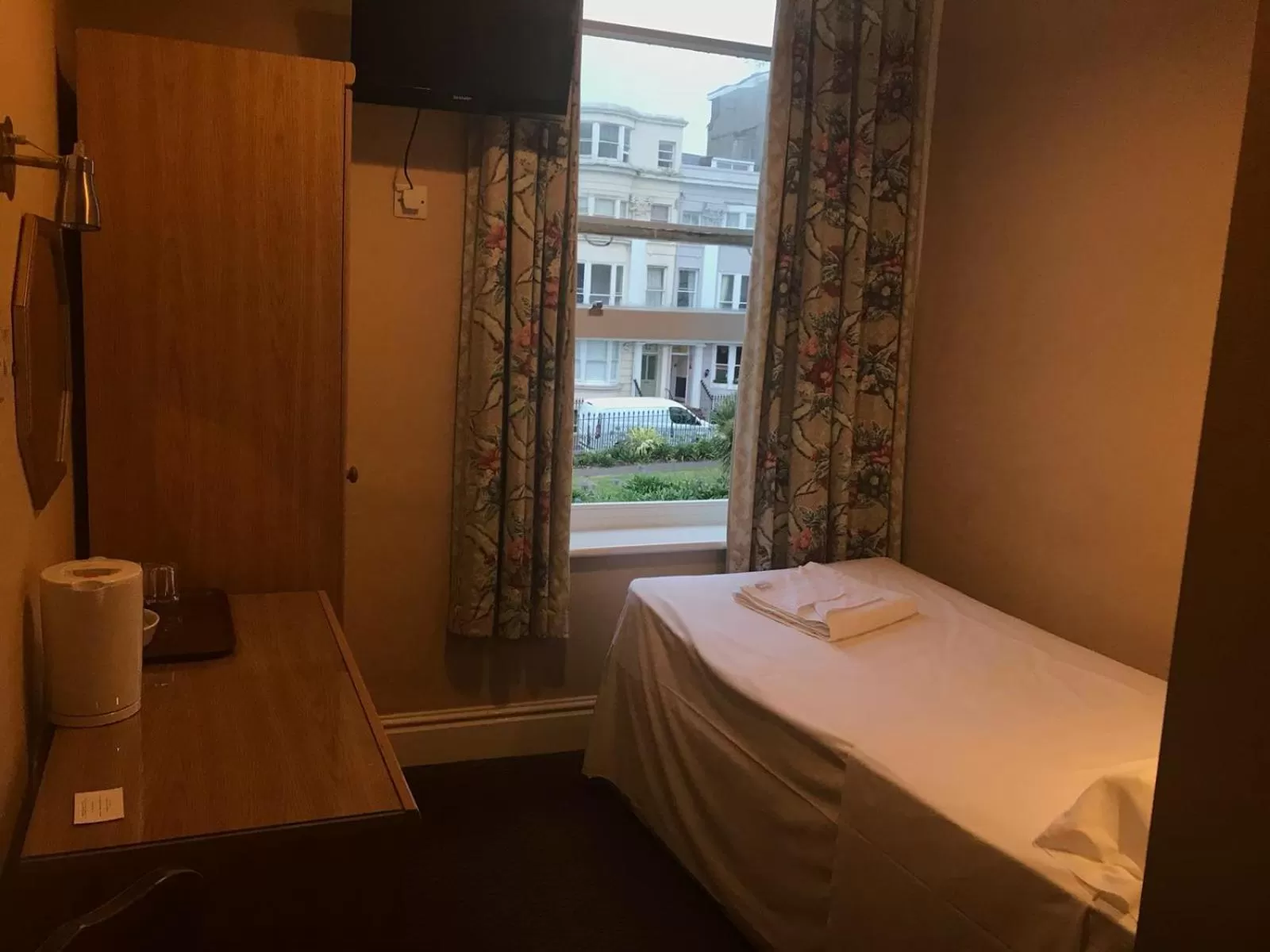 Bed in Ambassador Hotel