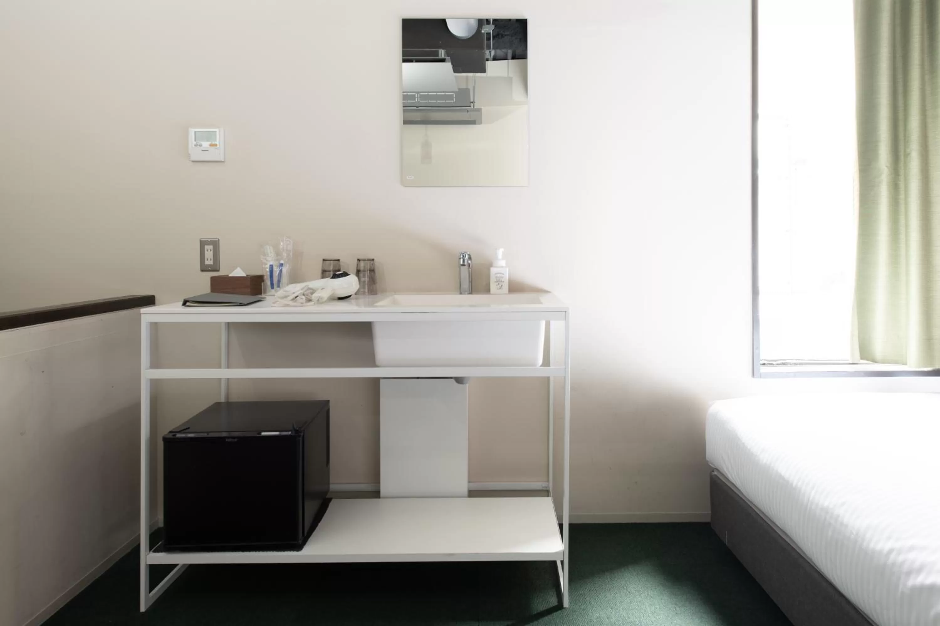 Photo of the whole room, Bed in HakoBA Hakodate by THE SHARE HOTELS